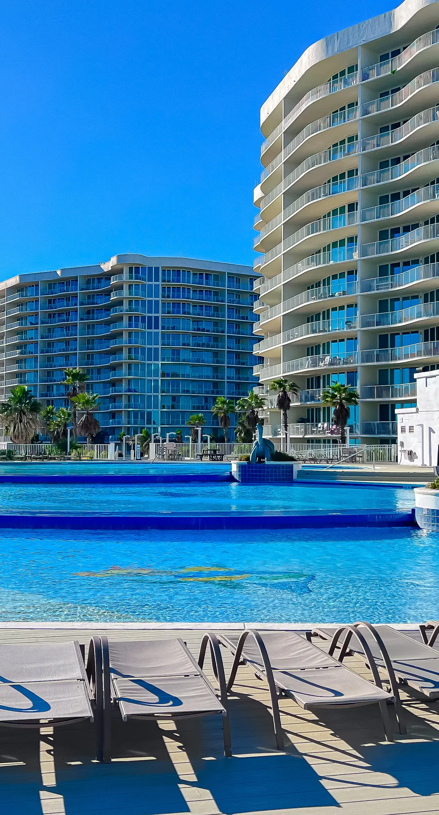 Brilliant water view condo with multiple pools, lazy river & internet