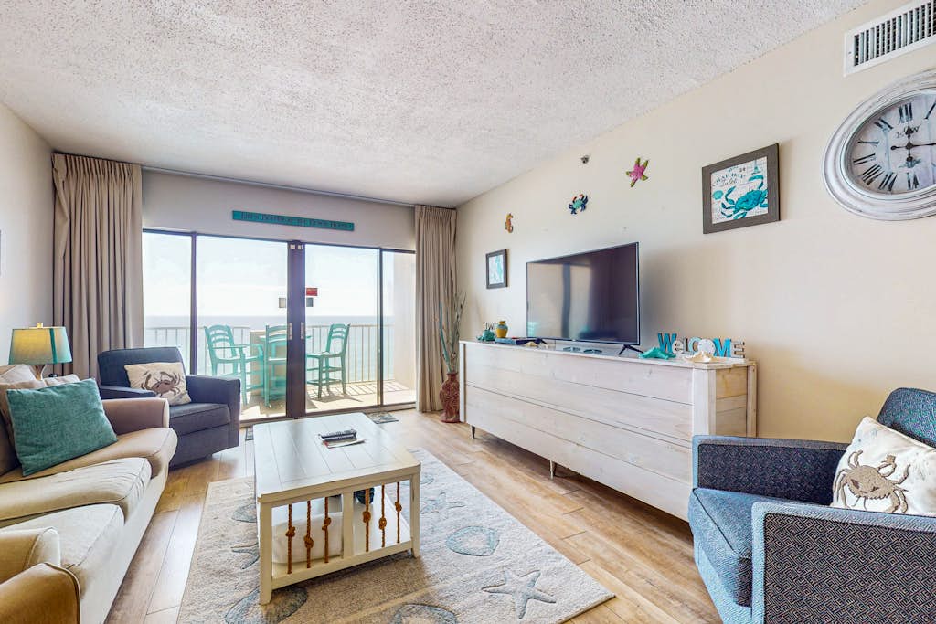 Tropical Winds beachfront beauty with pool, balcony, grills - close to beach