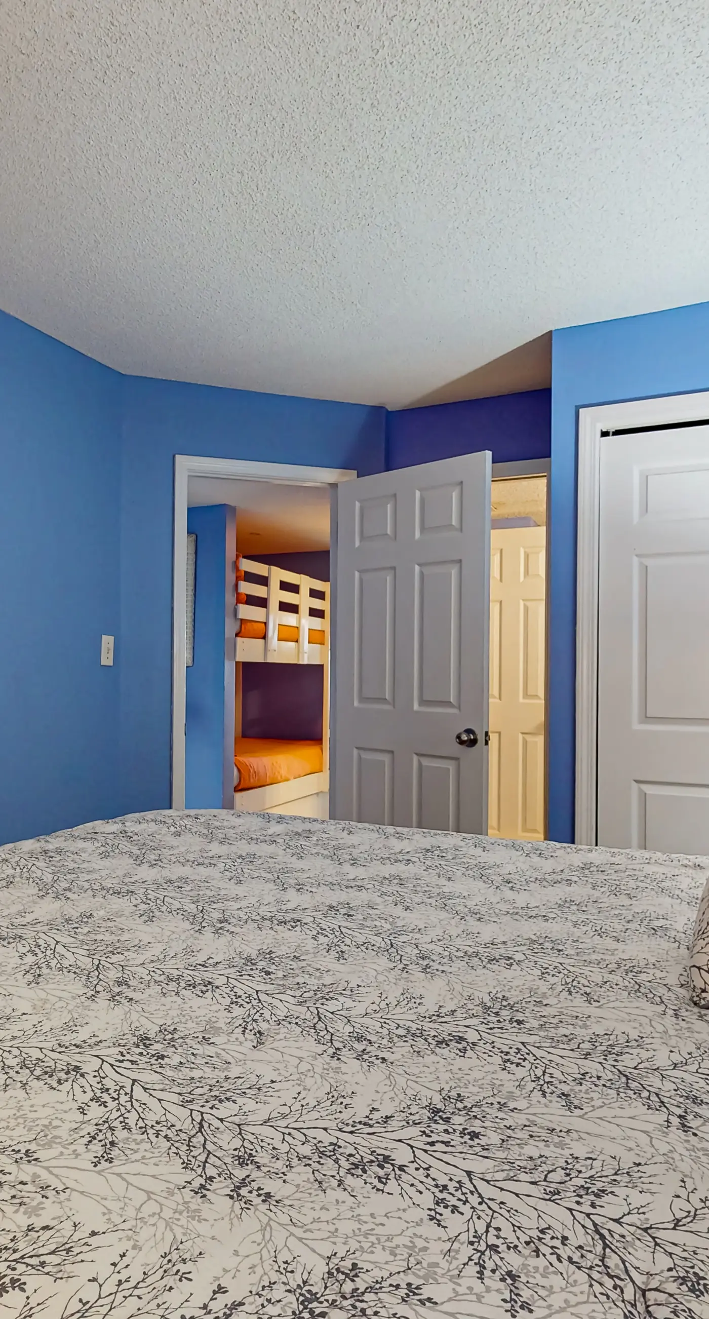 Clearwater condo with bunk room, pool, & balcony - walk to waves