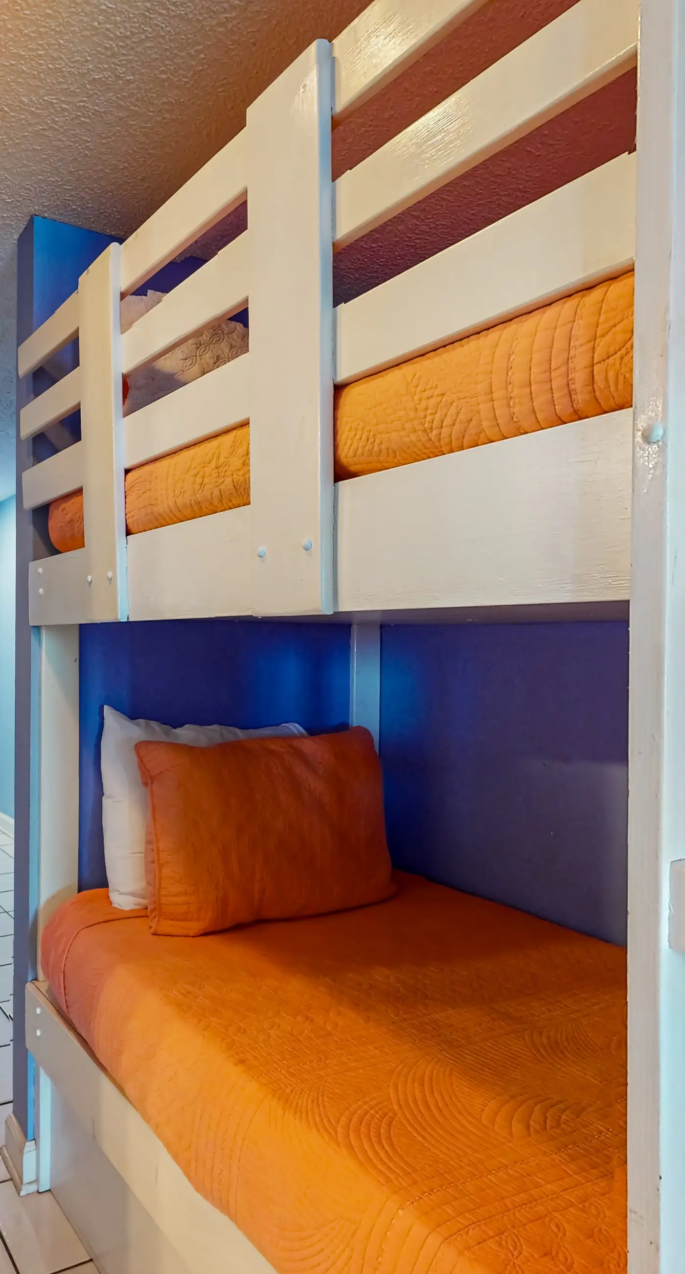 Clearwater condo with bunk room, pool, & balcony - walk to waves