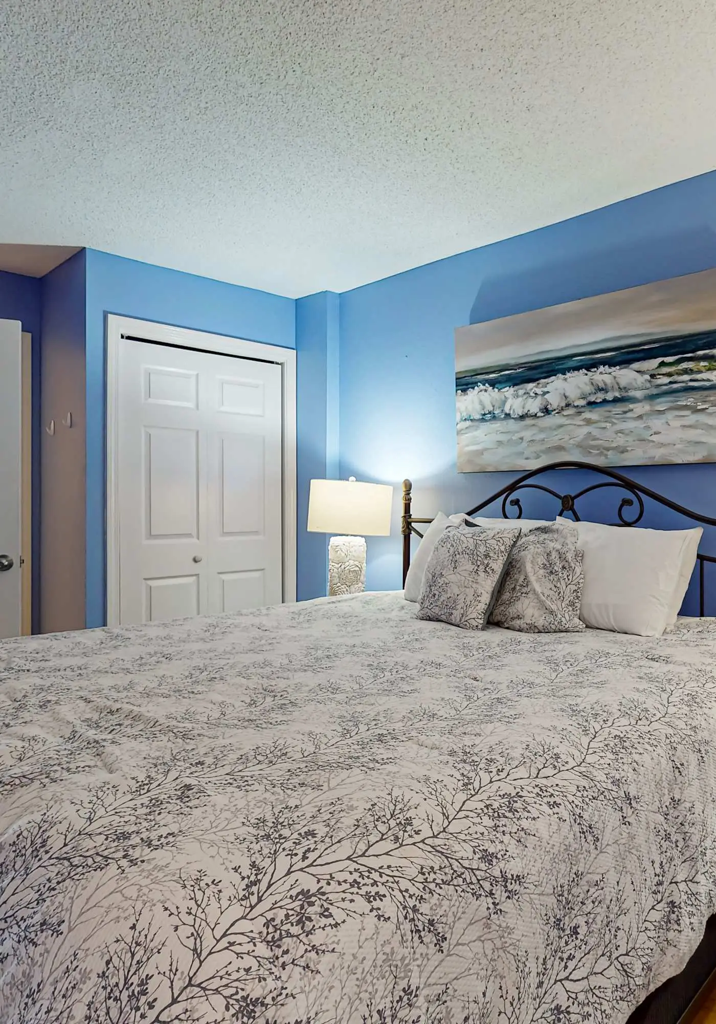 Clearwater condo with bunk room, pool, & balcony - walk to waves