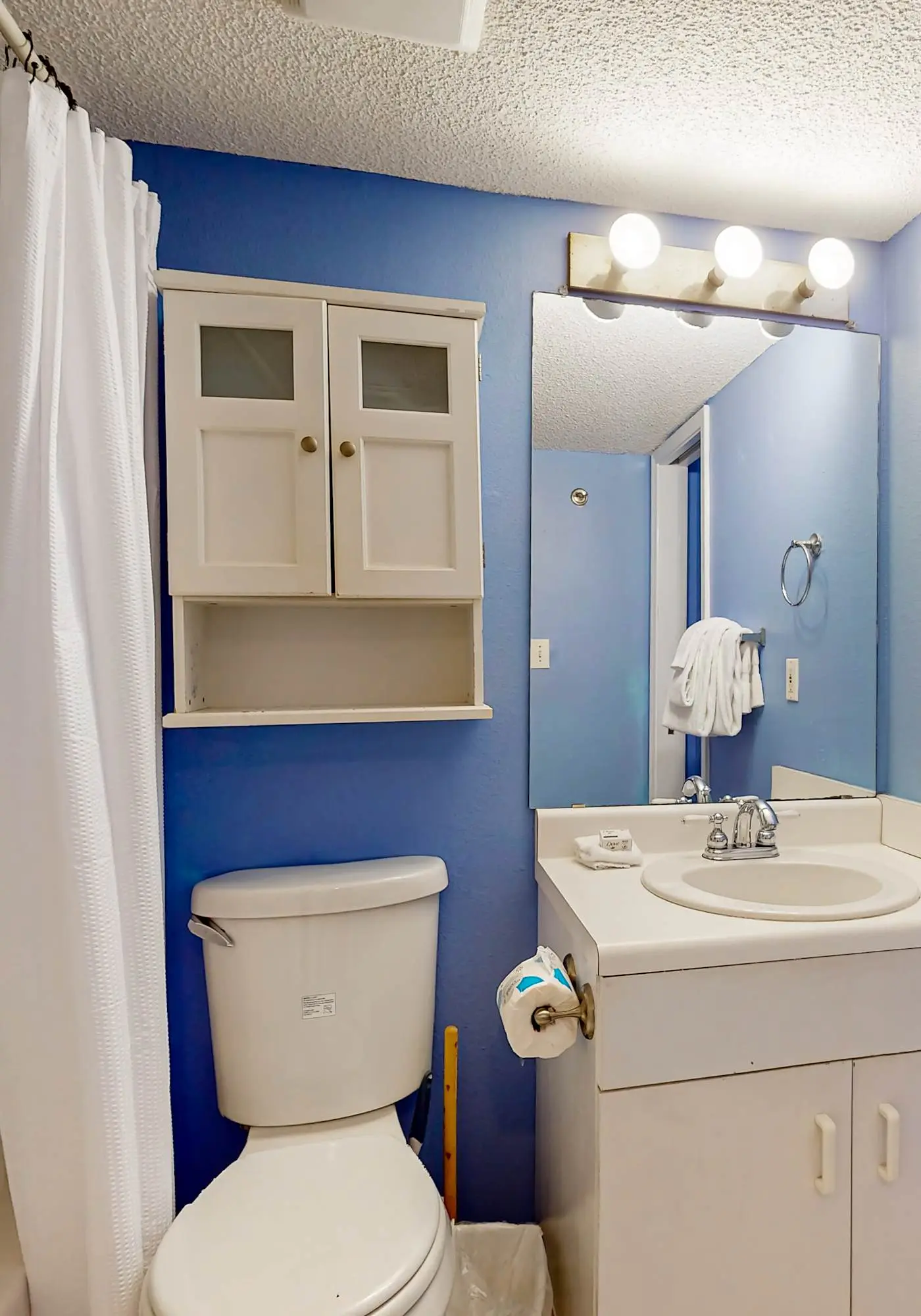 Clearwater condo with bunk room, pool, & balcony - walk to waves