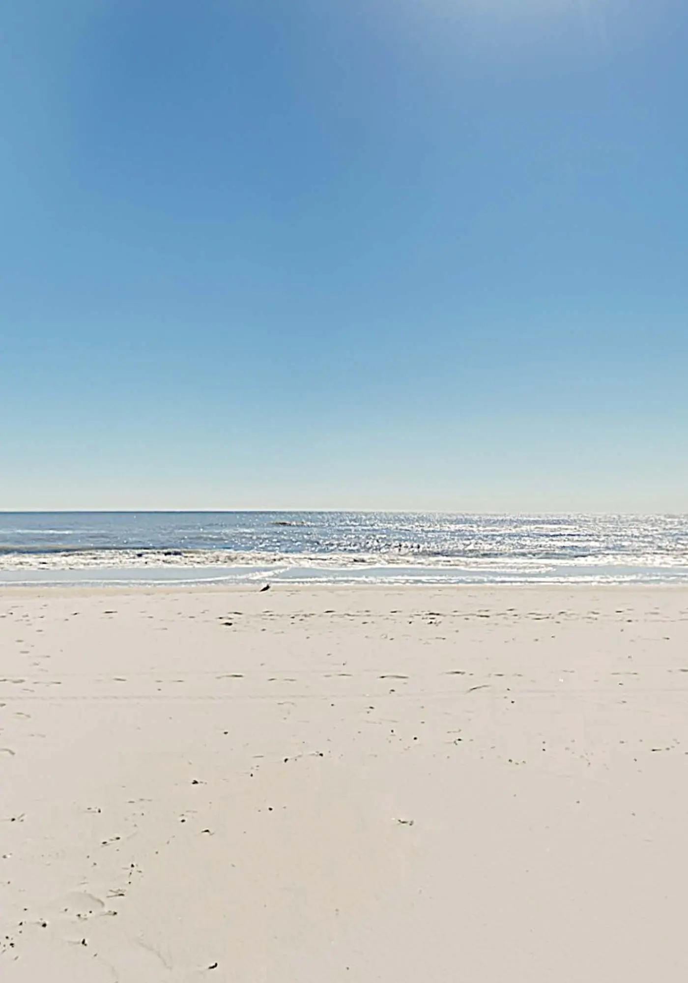 Clearwater condo with bunk room, pool, & balcony - walk to waves