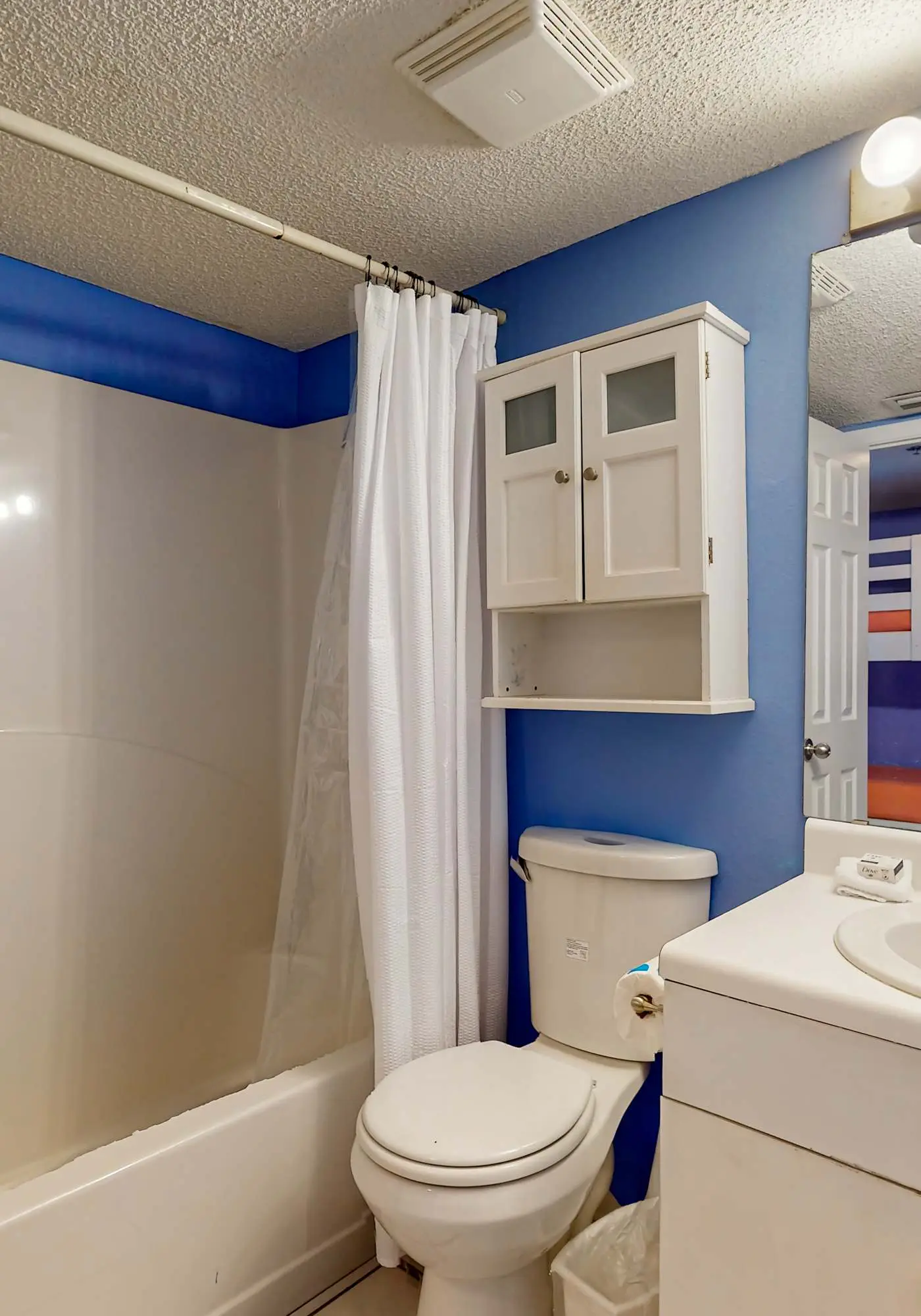 Clearwater condo with bunk room, pool, & balcony - walk to waves