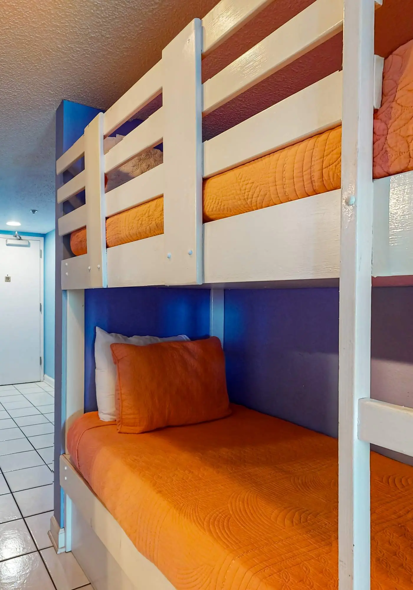 Clearwater condo with bunk room, pool, & balcony - walk to waves