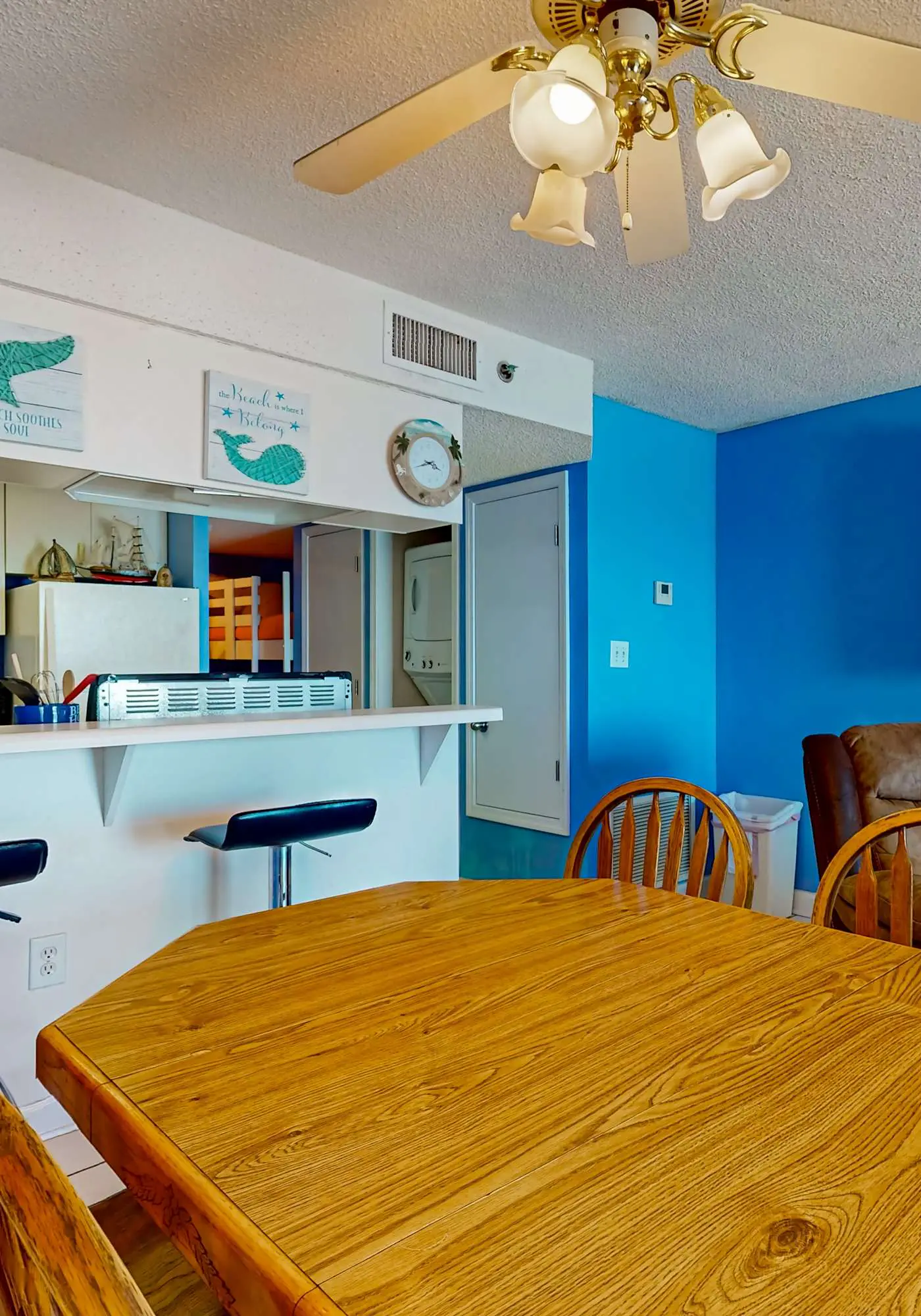 Clearwater condo with bunk room, pool, & balcony - walk to waves