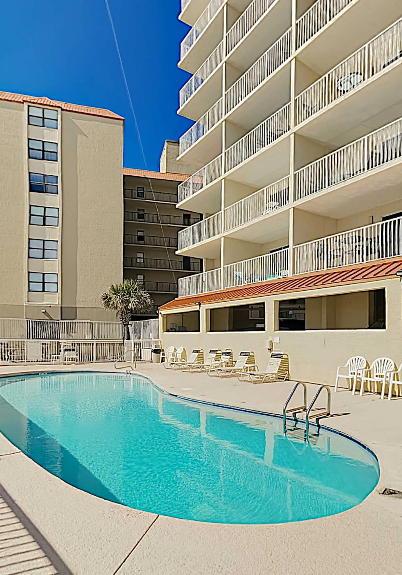 Clearwater condo with bunk room, pool, & balcony - walk to waves