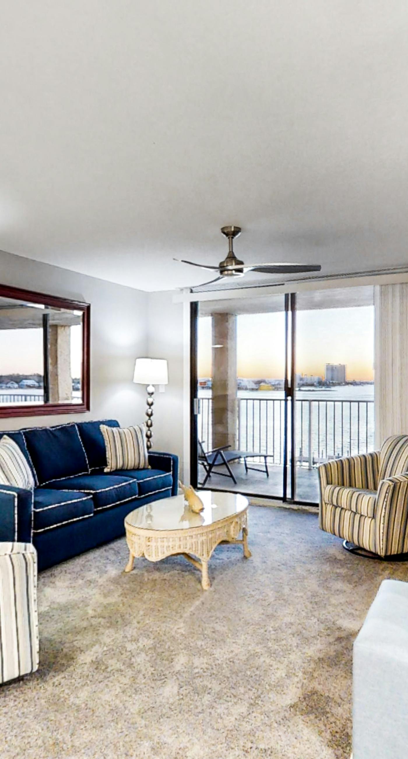 Lagoon-front, 3rd-floor condo with balcony, AC, & outdoor pool