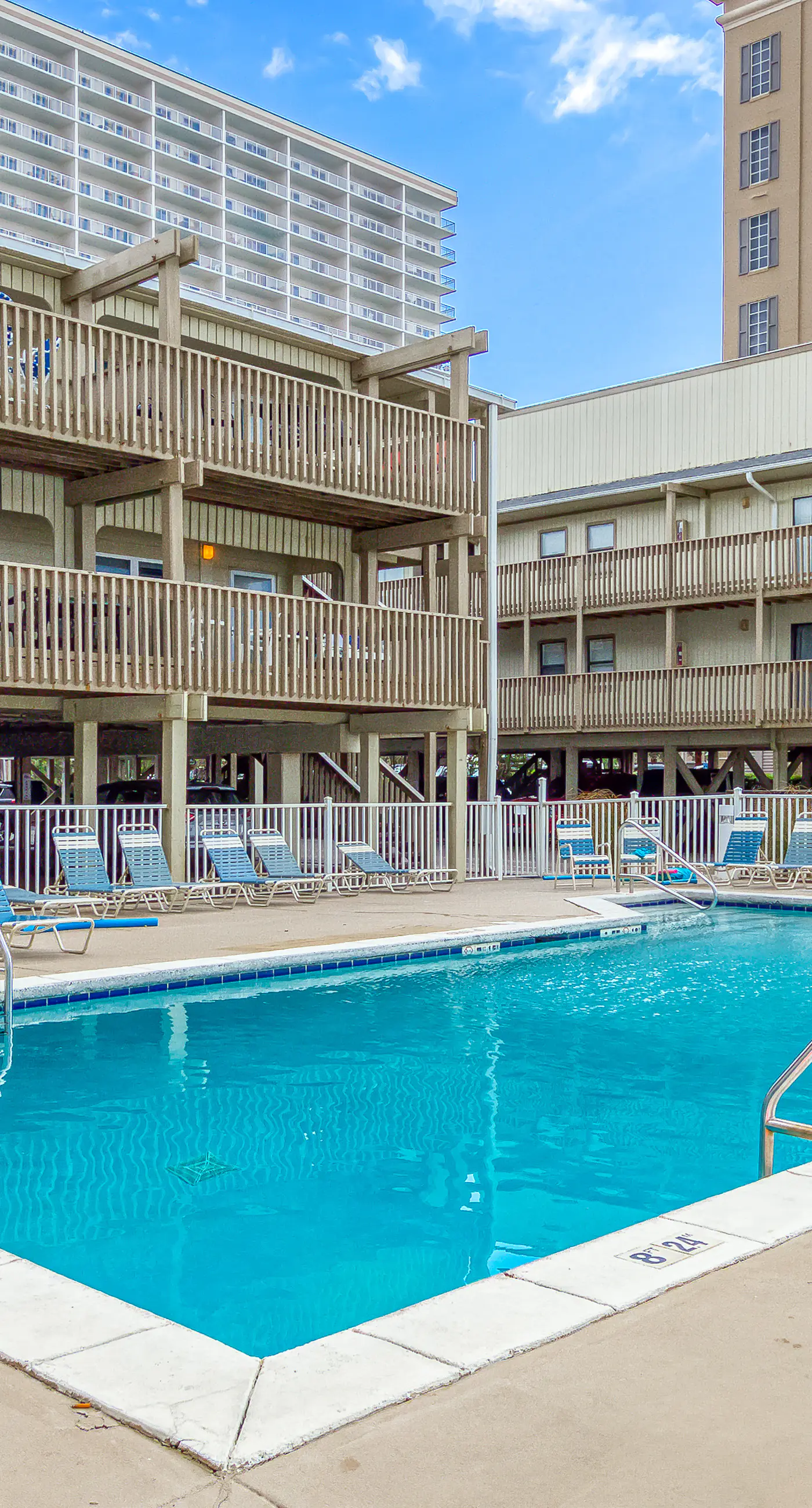 Upgraded beachfront condo with a pool, beach access & washer,dryer