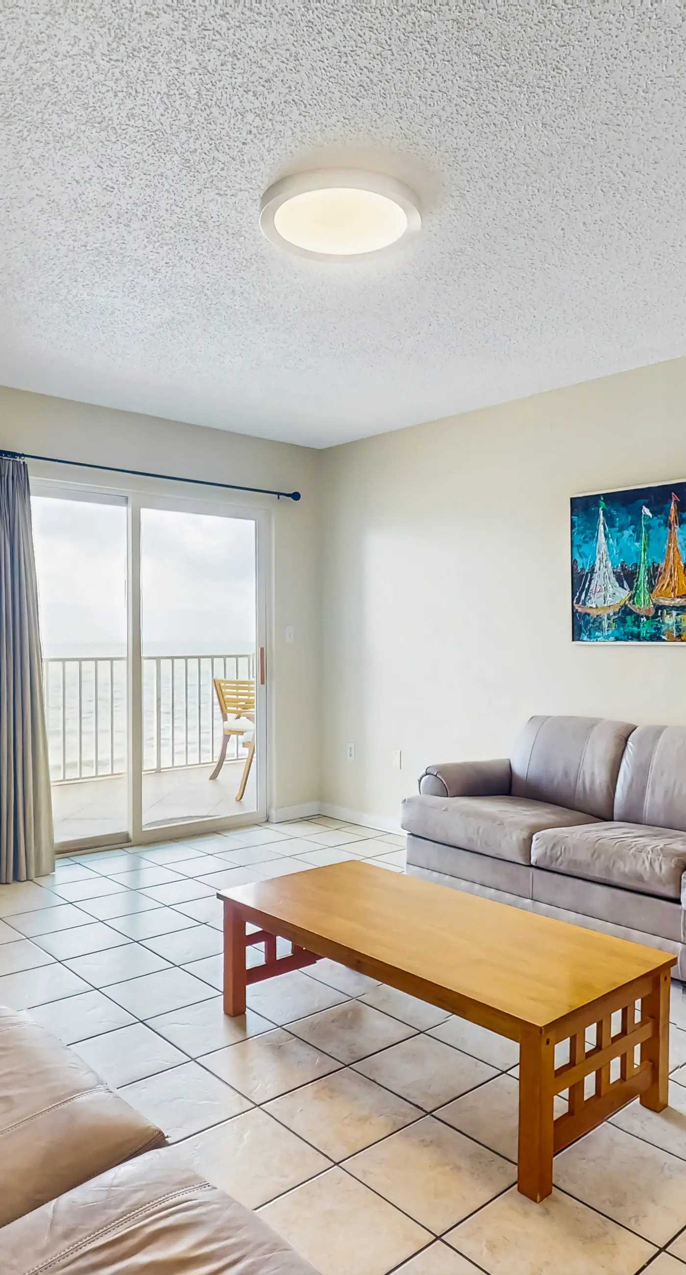 Gulf-front condo with furnished balcony, fast WiFi, pool & fitness room