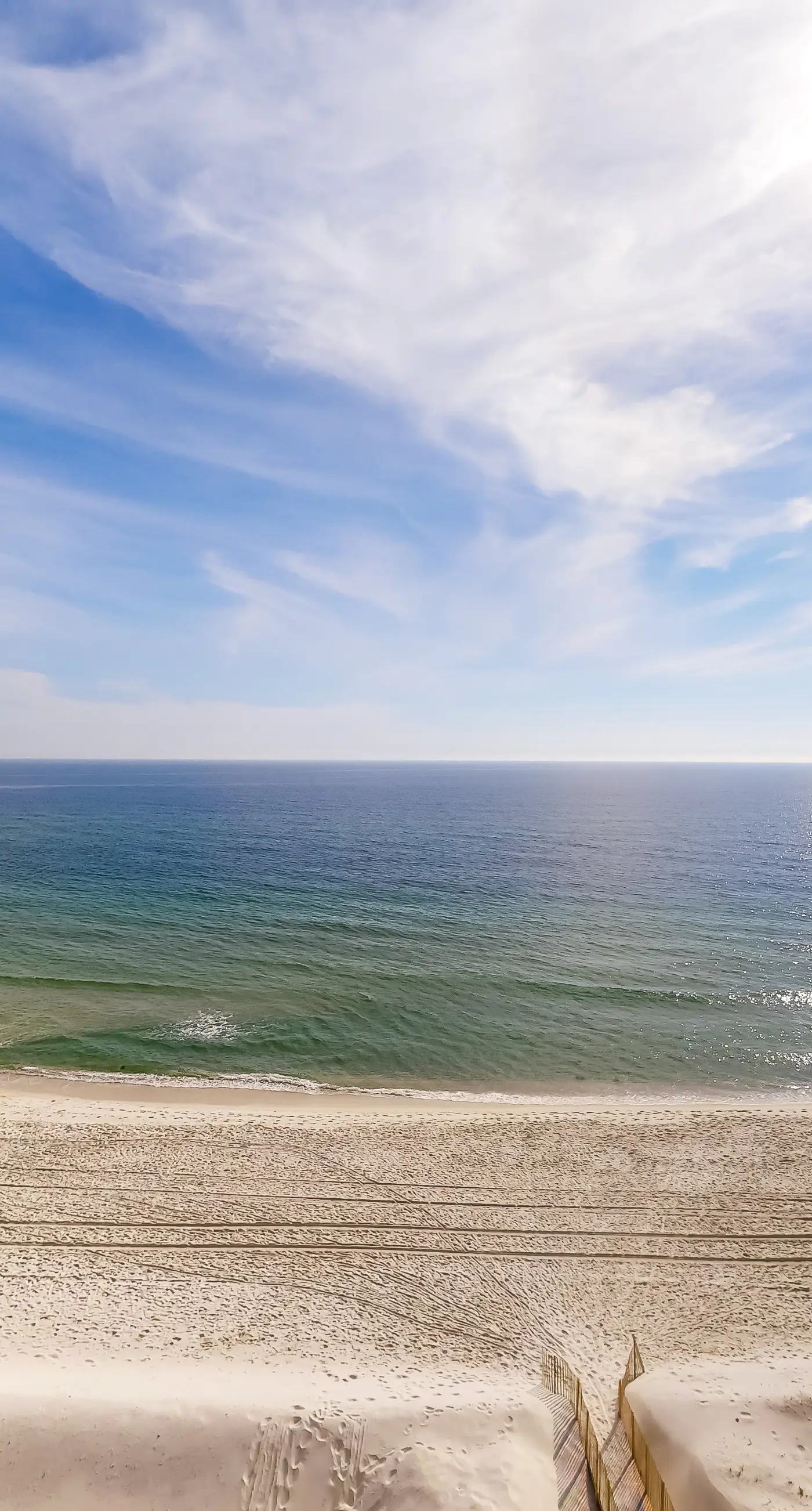 Gulf-front condo with furnished balcony, fast WiFi, pool & fitness room