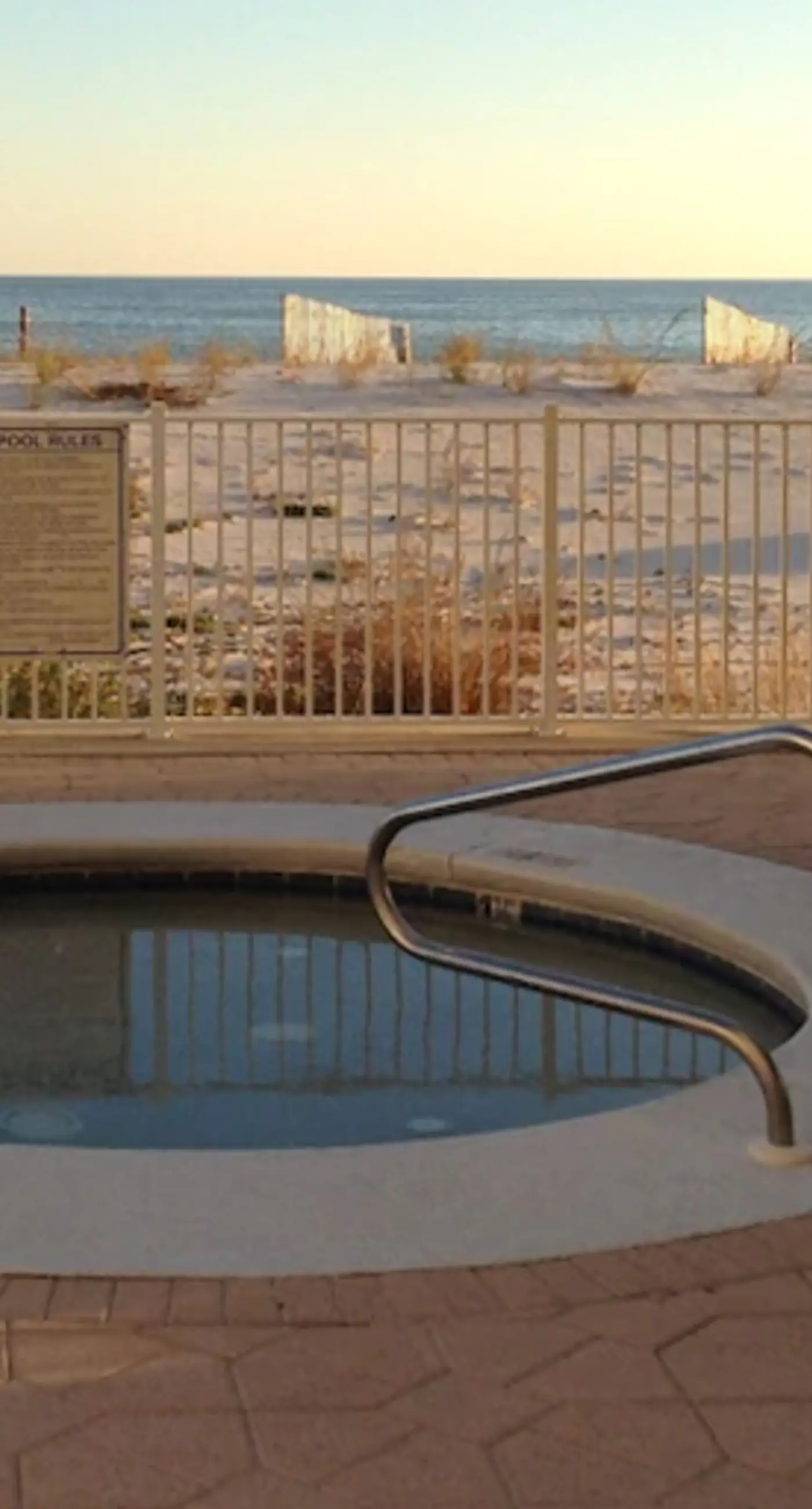 Gulf-front condo with furnished balcony, fast WiFi, pool & fitness room