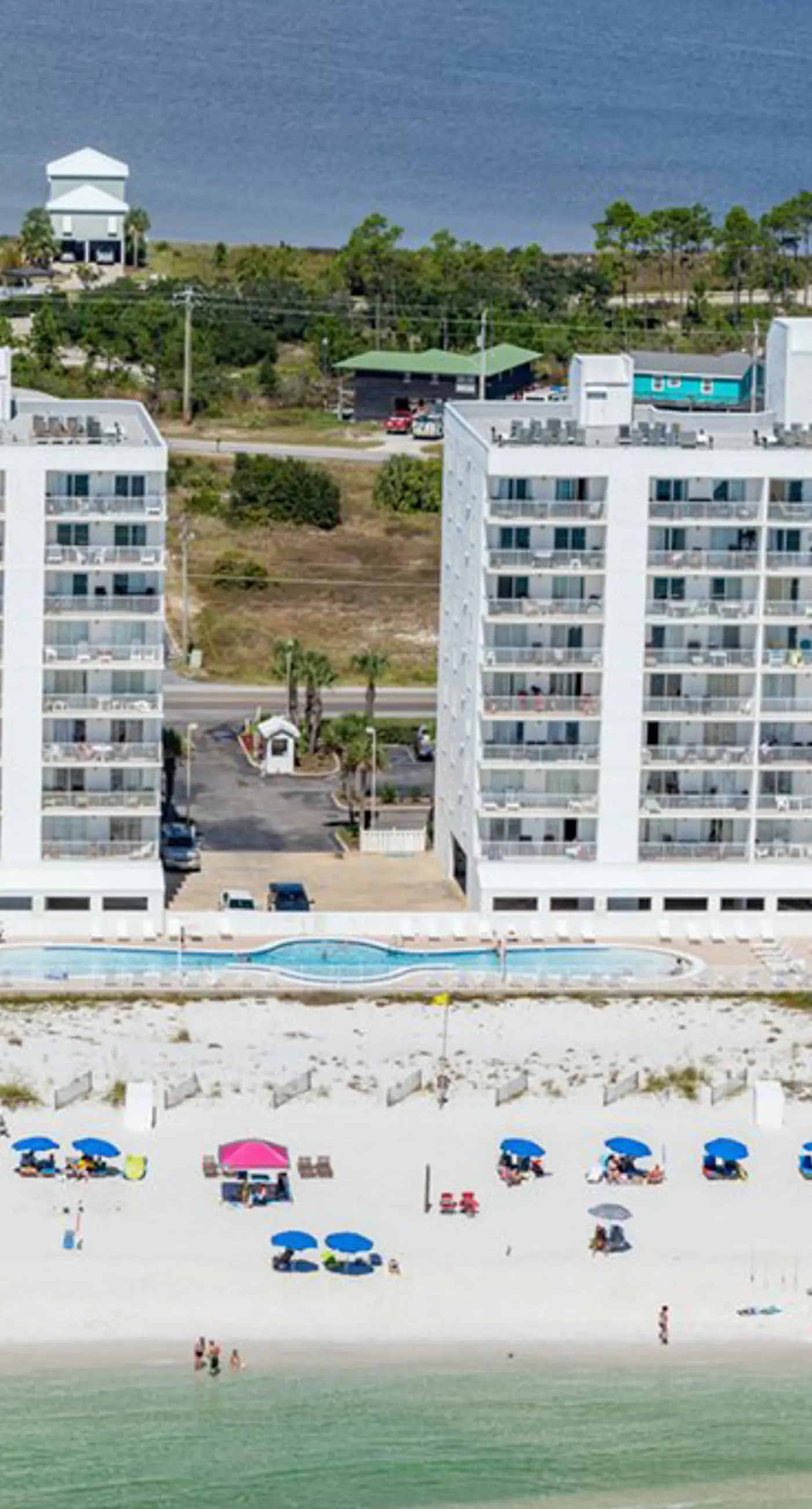 Gulf-front condo with furnished balcony, fast WiFi, pool & fitness room