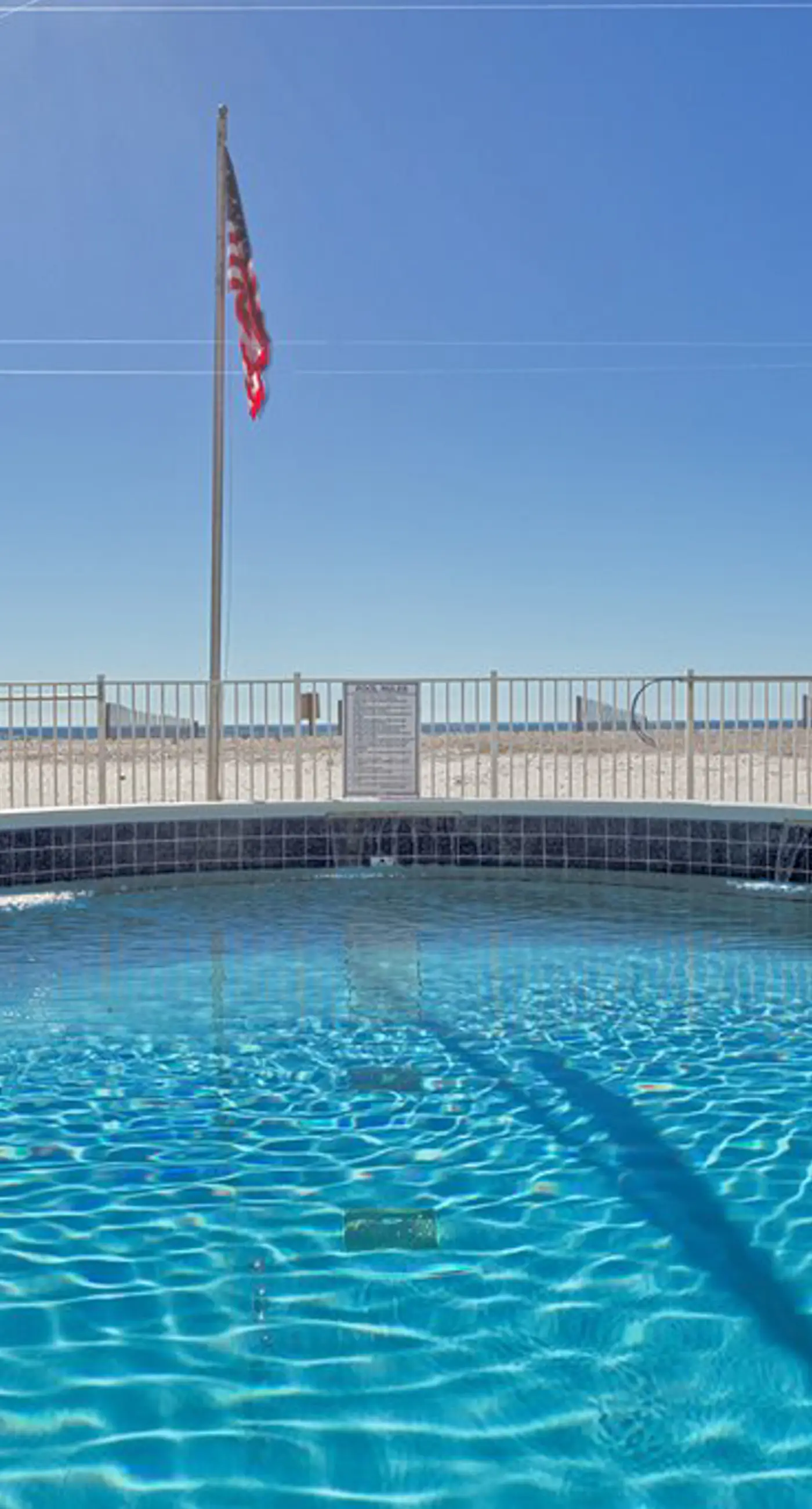 Gulf-front condo with furnished balcony, fast WiFi, pool & fitness room