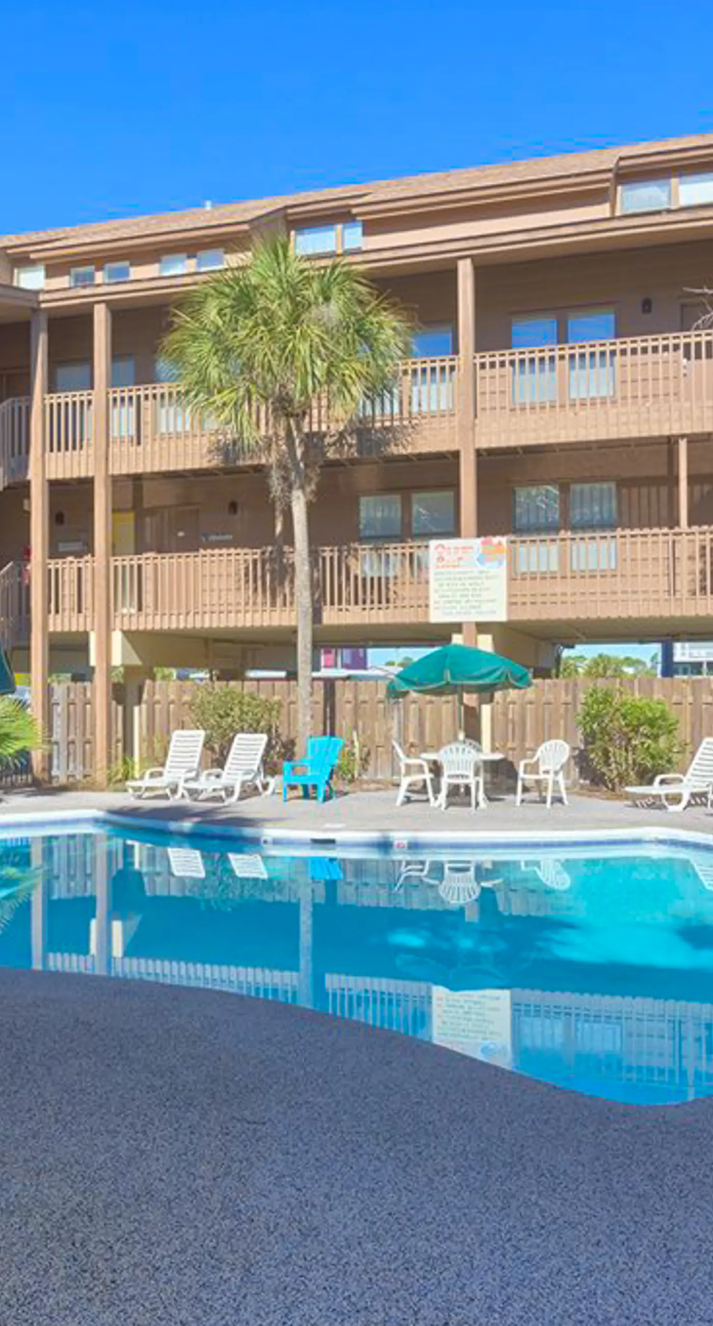 Second Floor Condo with Shared Pool, Fast WiFi, Central AC, and Full Kitchen