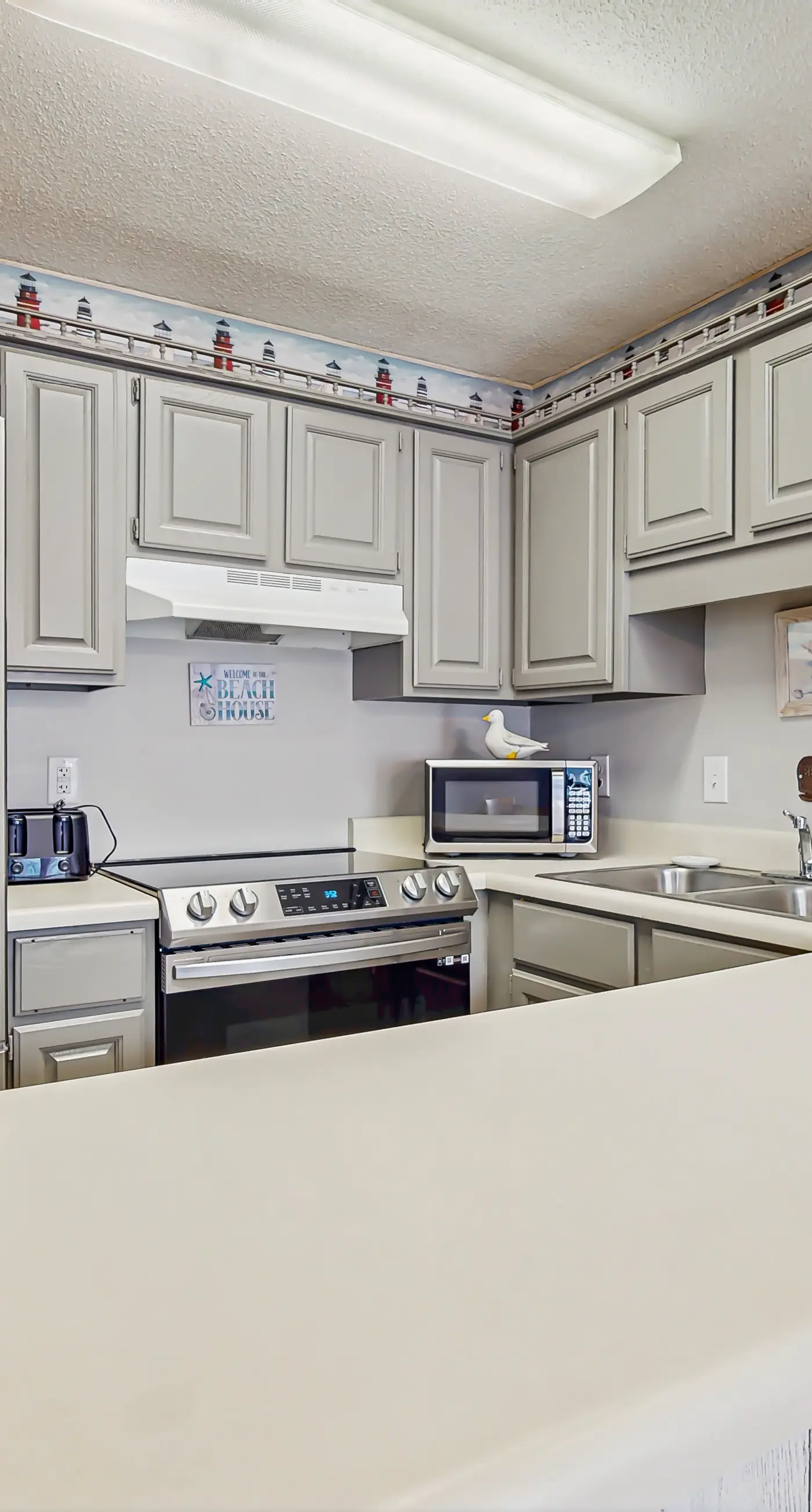 Second Floor Condo with Shared Pool, Fast WiFi, Central AC, and Full Kitchen