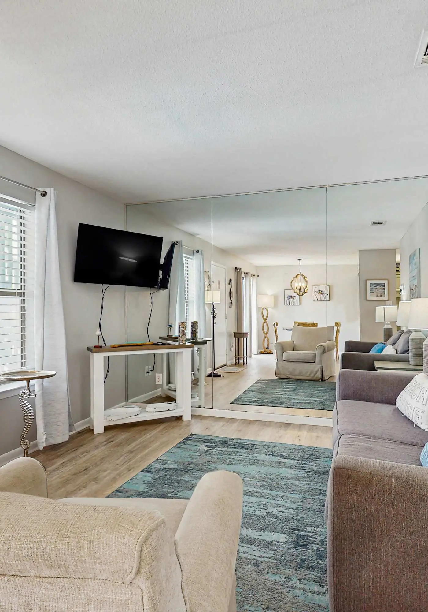 Second Floor Condo with Shared Pool, Fast WiFi, Central AC, and Full Kitchen