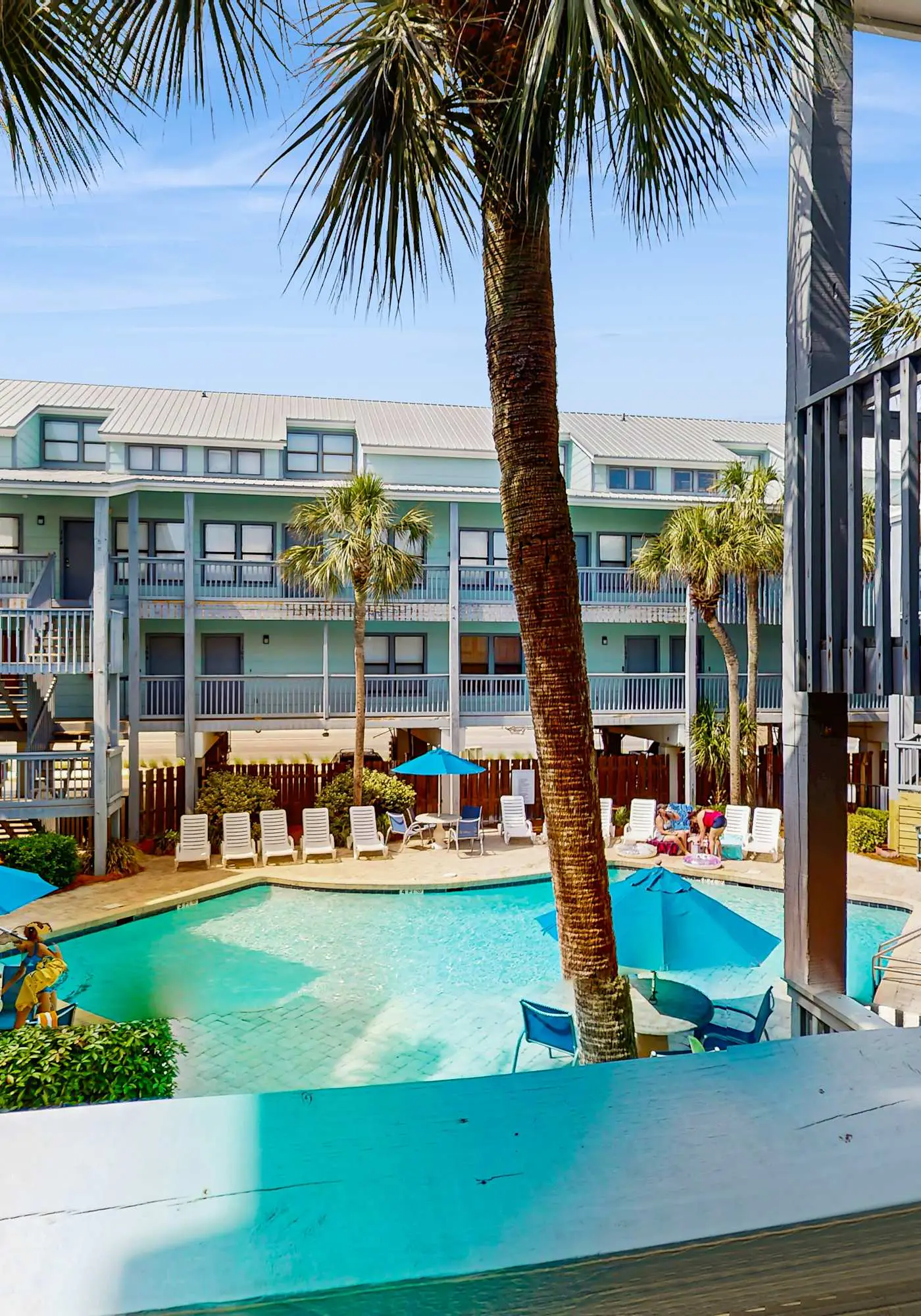 Second Floor Condo with Shared Pool, Fast WiFi, Central AC, and Full Kitchen