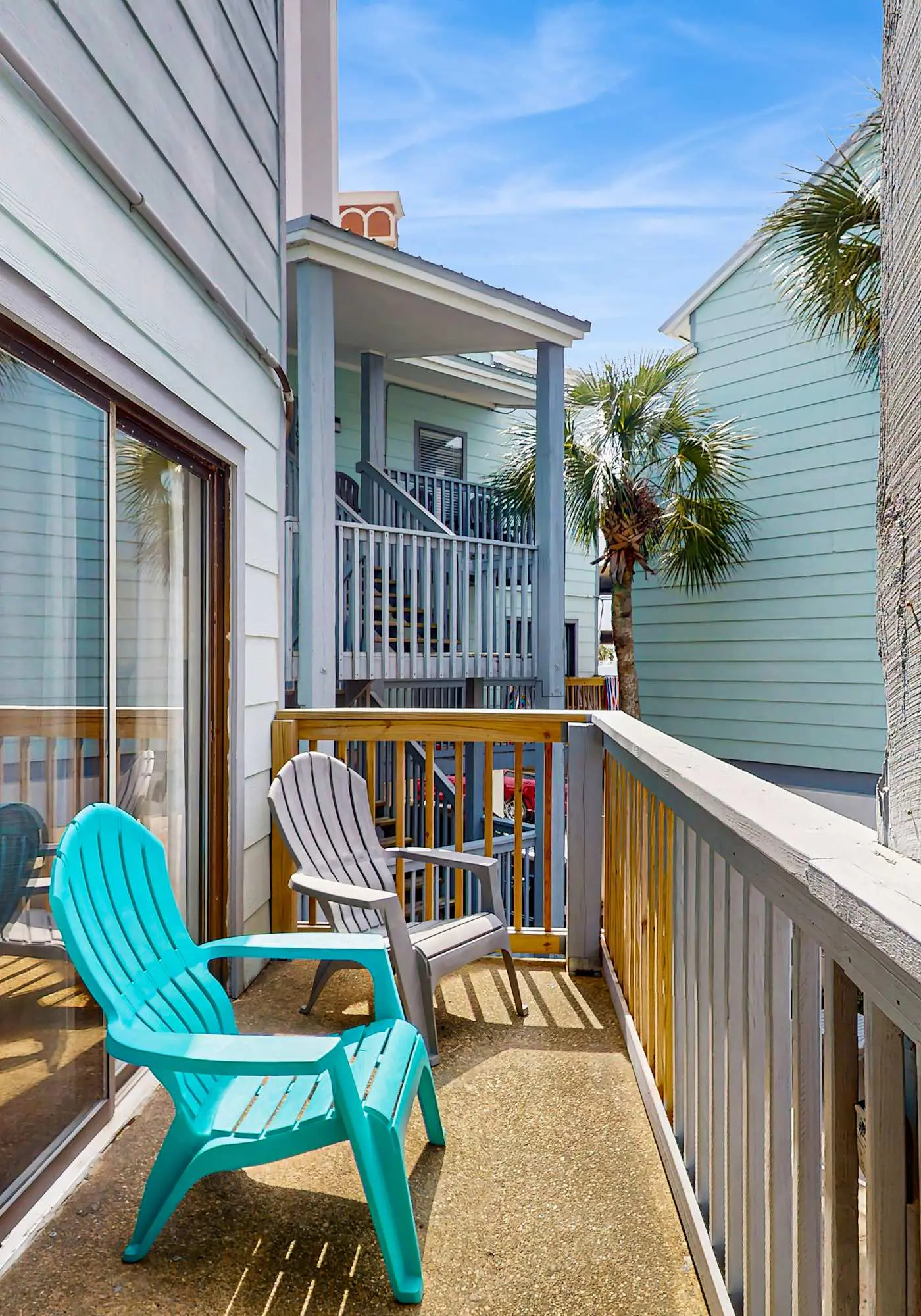 Second Floor Condo with Shared Pool, Fast WiFi, Central AC, and Full Kitchen