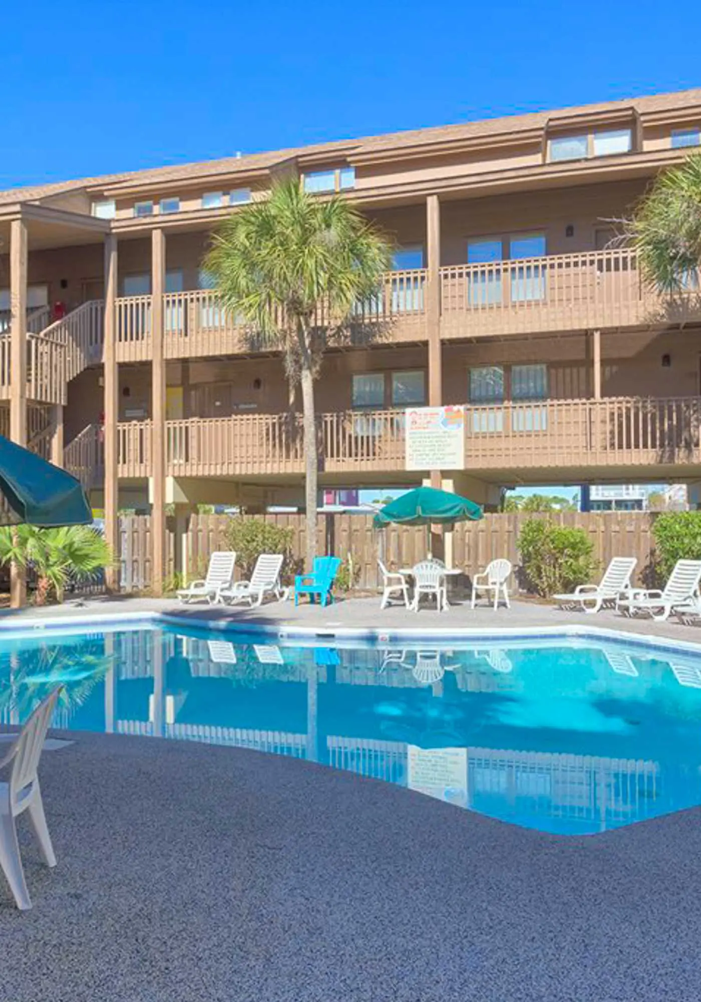 Second Floor Condo with Shared Pool, Fast WiFi, Central AC, and Full Kitchen