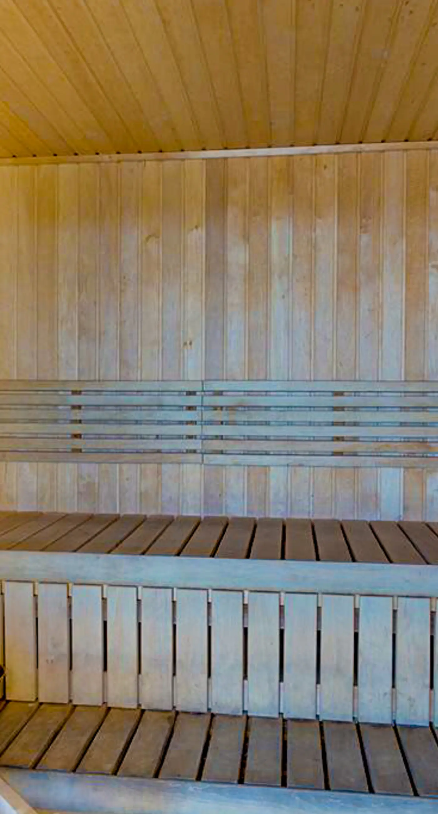 Gulf-view getaway with on-site pool, hot tub, sauna, and fitness center