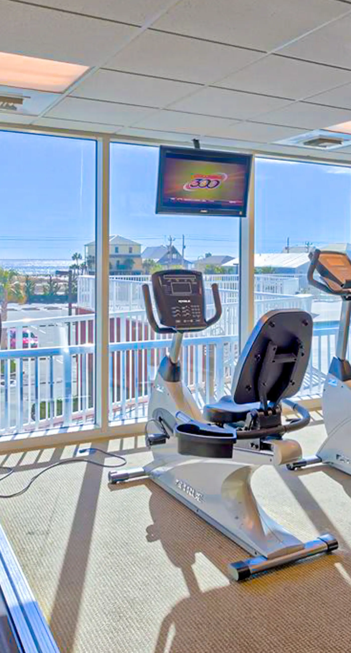 Gulf-view getaway with on-site pool, hot tub, sauna, and fitness center