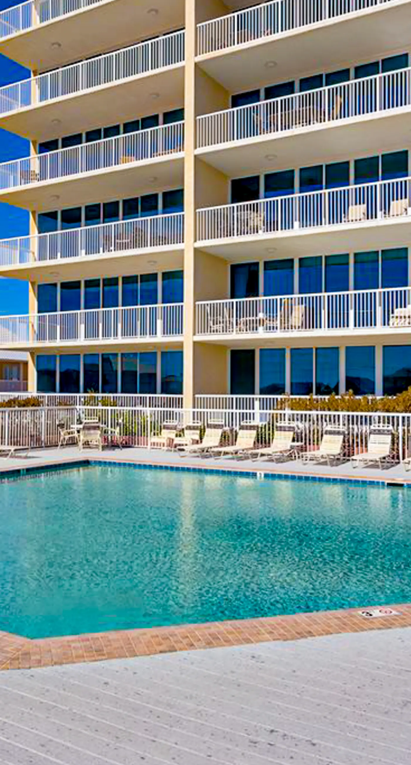 Gulf-view getaway with on-site pool, hot tub, sauna, and fitness center