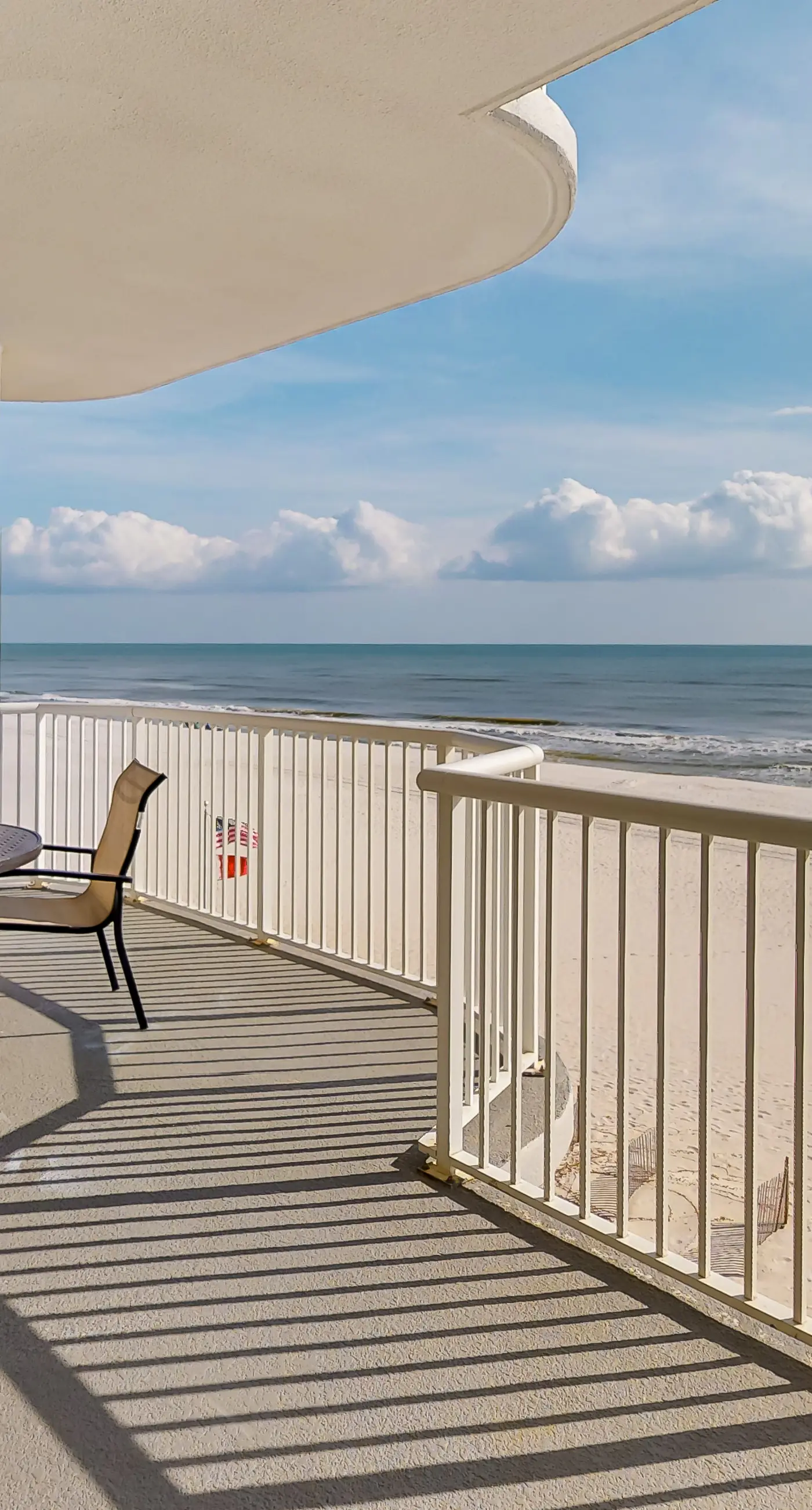 Beachfront corner condo with amazing Gulf views, balcony, pools & hot tubs
