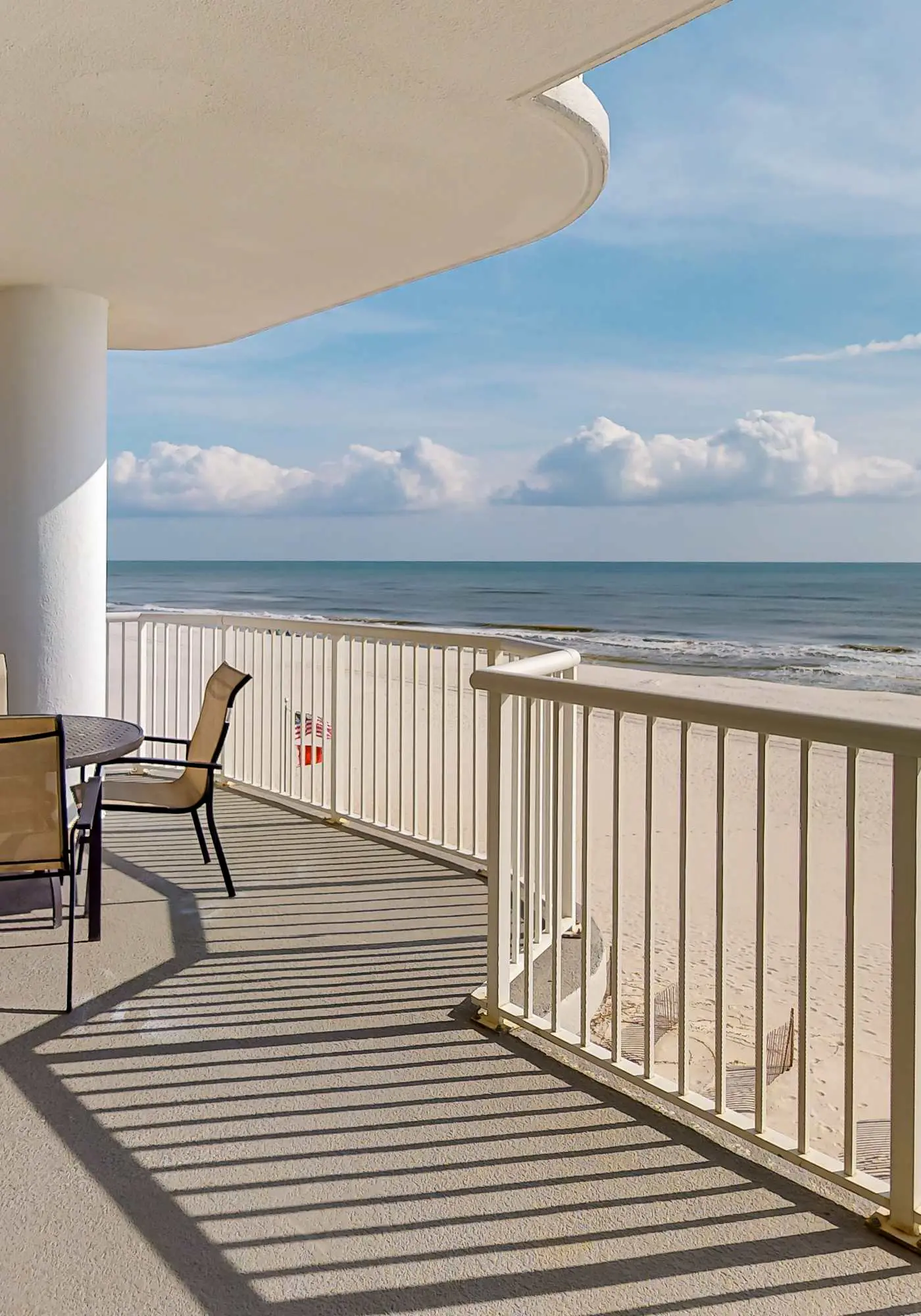 Beachfront corner condo with amazing Gulf views, balcony, pools & hot tubs