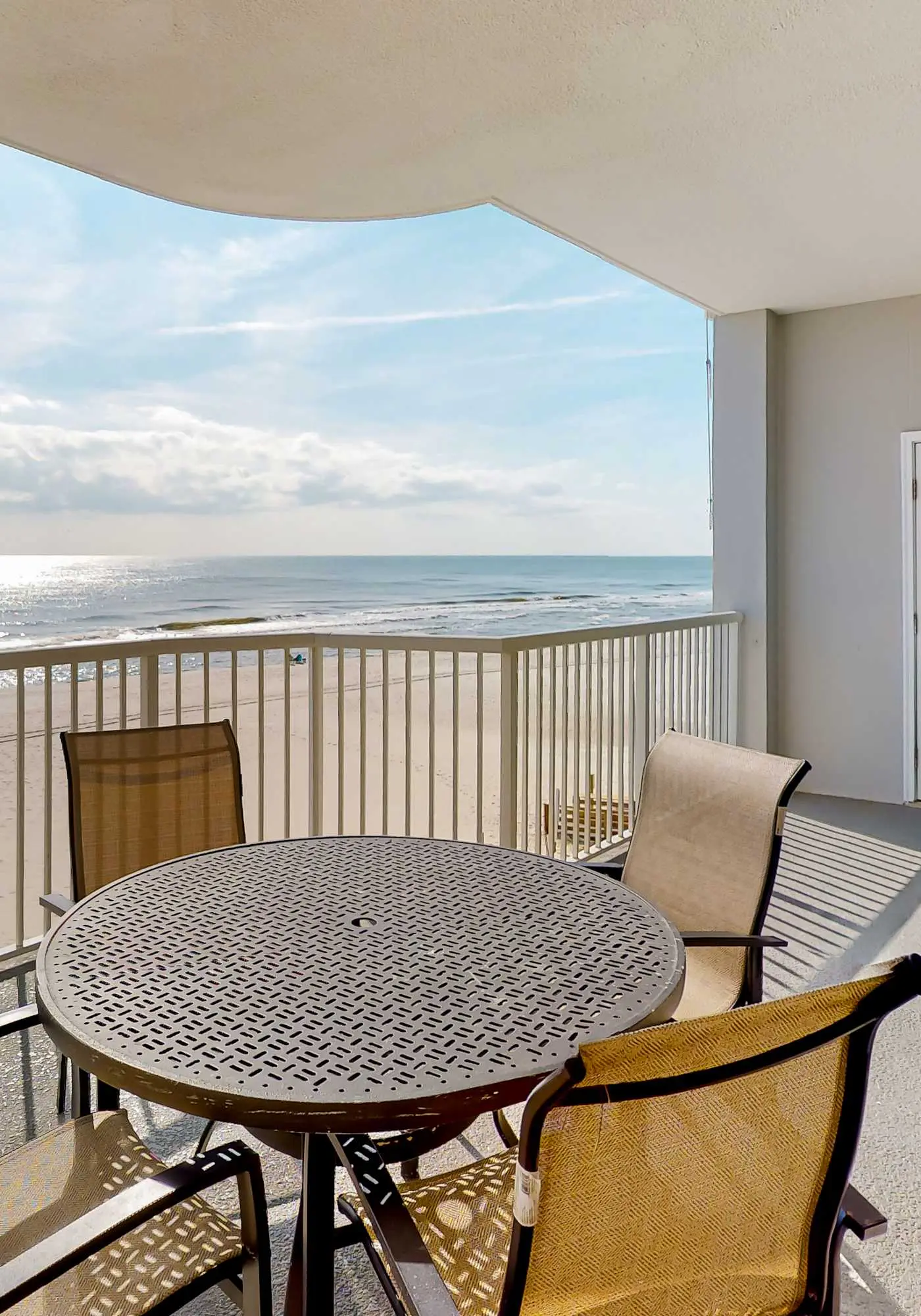 Beachfront corner condo with amazing Gulf views, balcony, pools & hot tubs