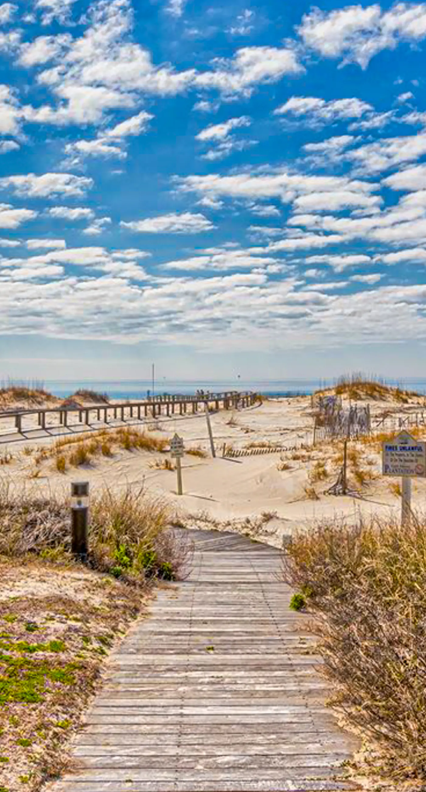 Gulf-view condo with 4 pools, hot tubs, beach access, central AC, & washer/dryer