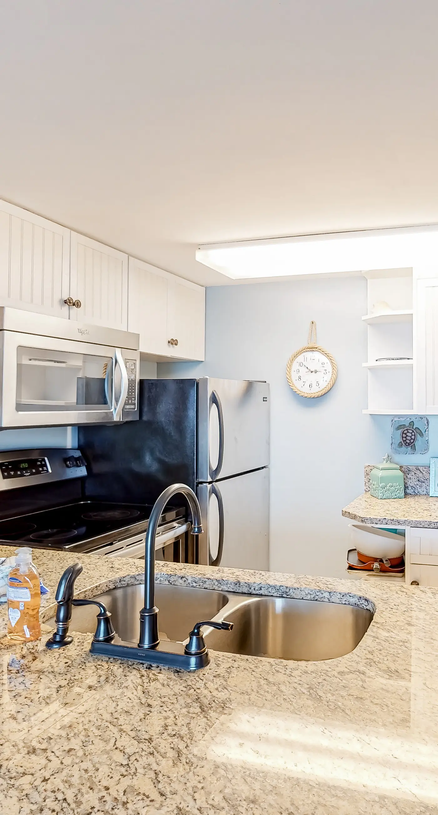 Gulf-view condo with 4 pools, hot tubs, beach access, central AC, & washer/dryer