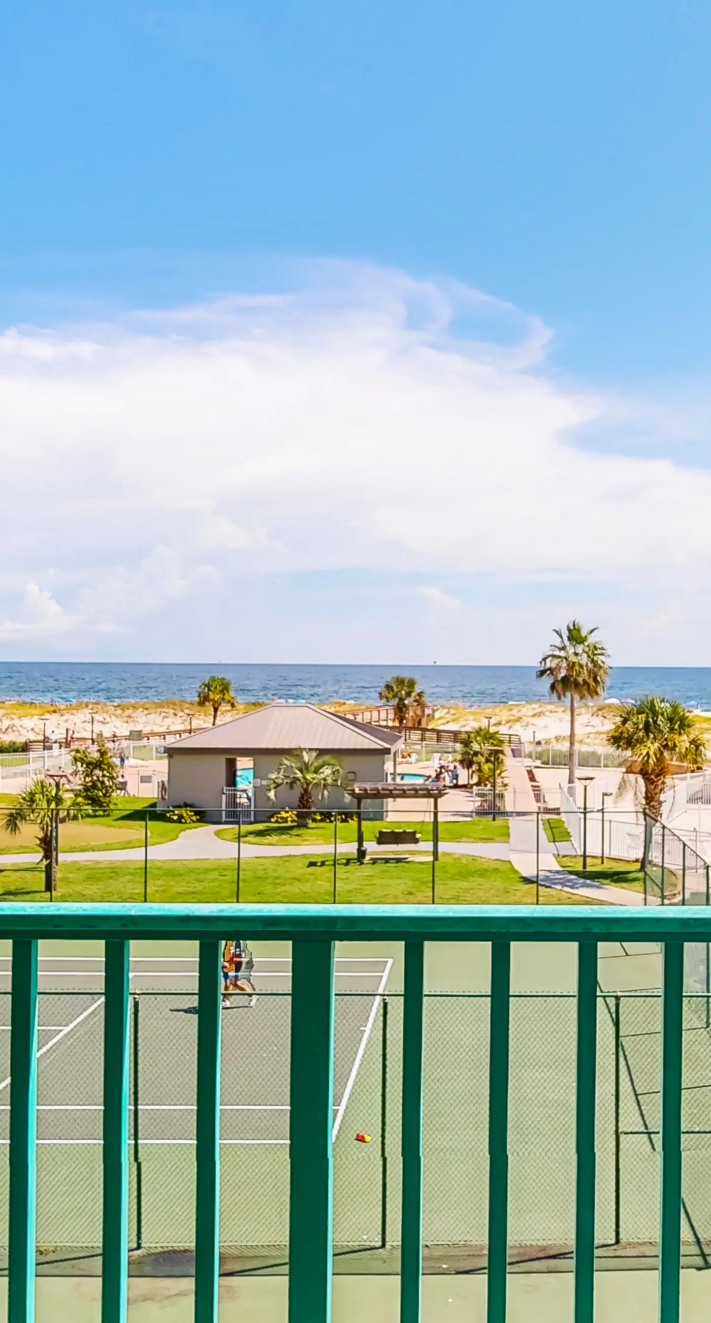 Gulf-view condo with 4 pools, hot tubs, beach access, central AC, & washer/dryer