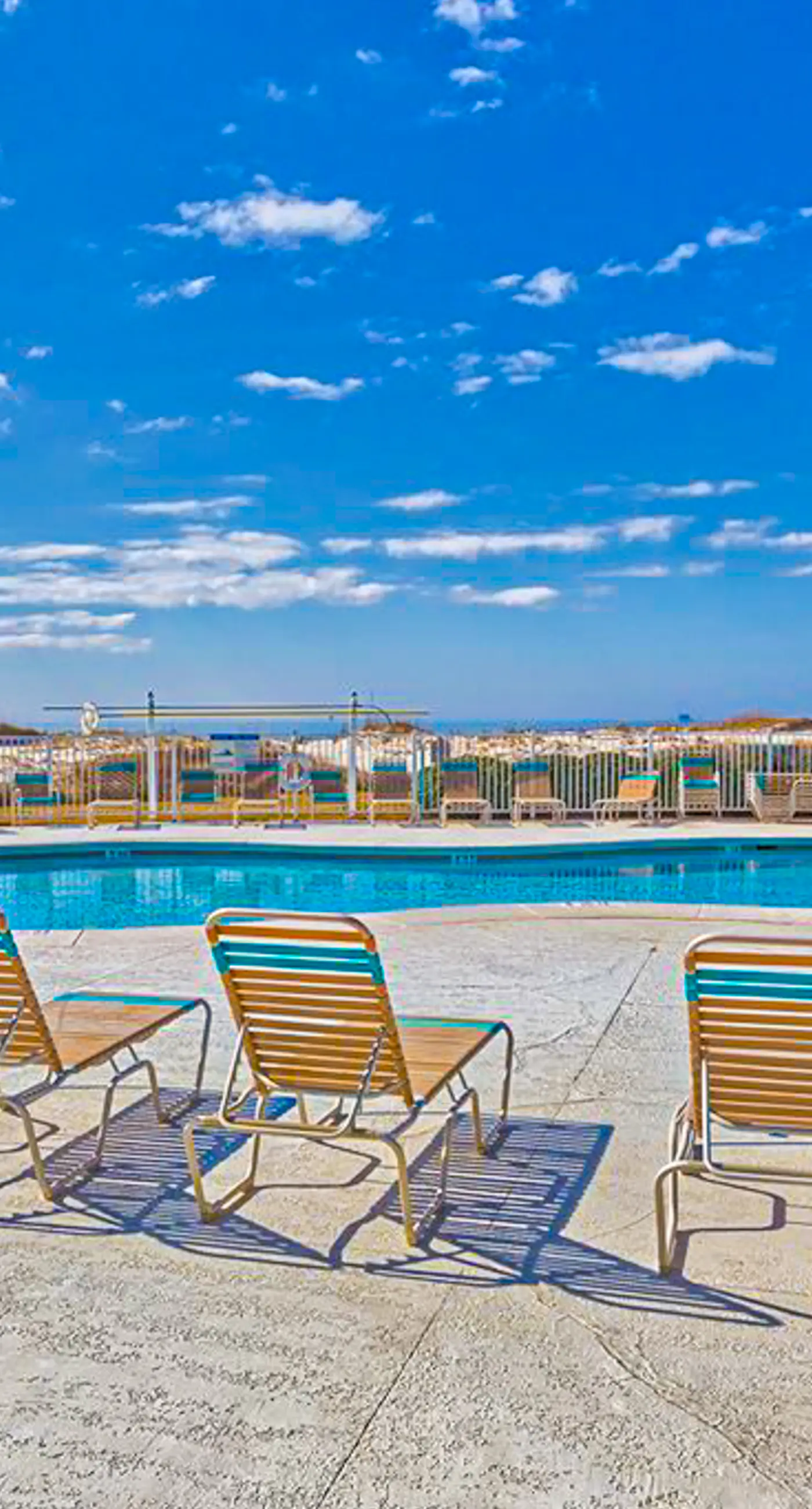Gulf-view condo with 4 pools, hot tubs, beach access, central AC, & washer/dryer