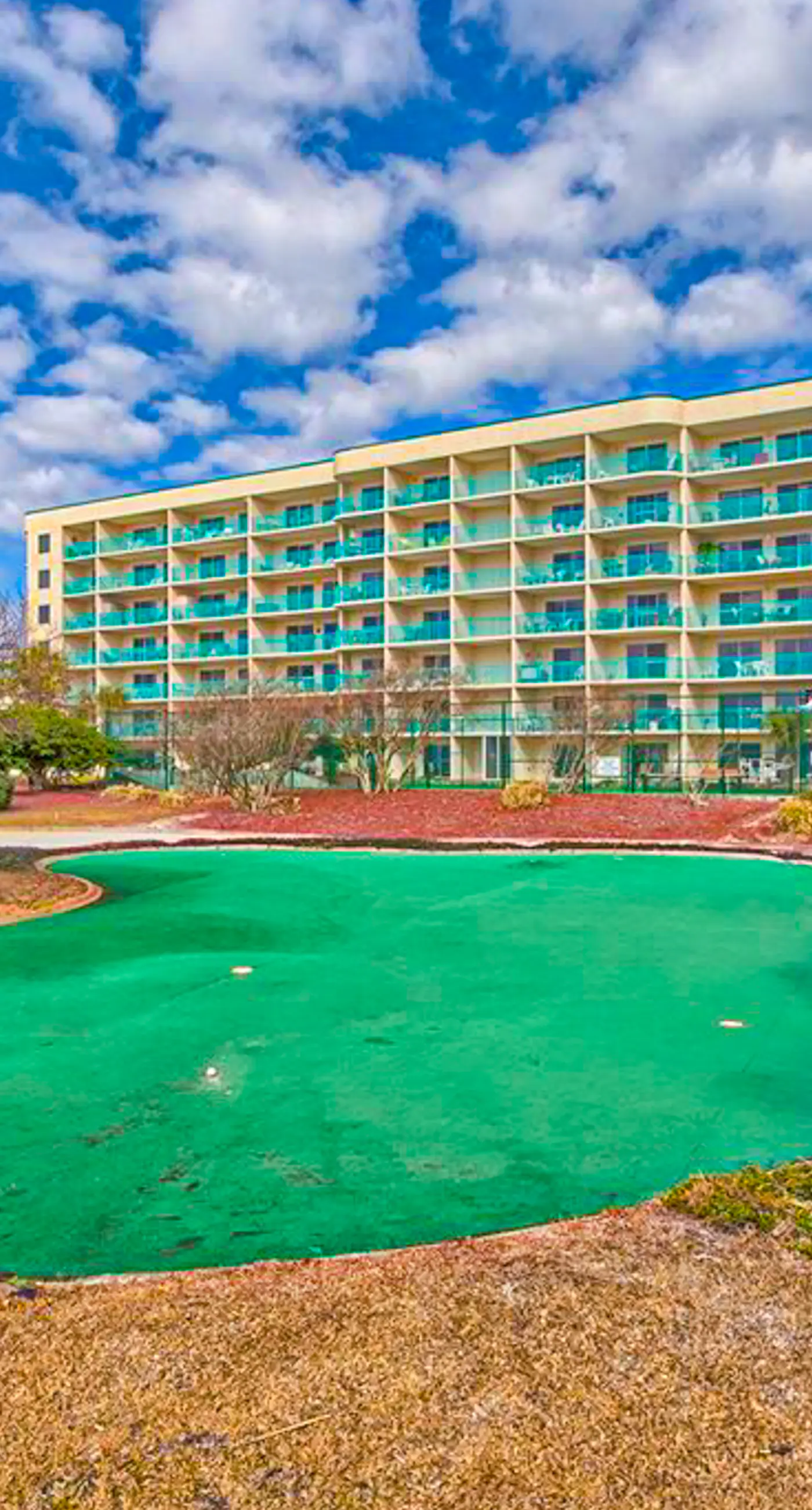 Gulf-view condo with 4 pools, hot tubs, beach access, central AC, & washer/dryer