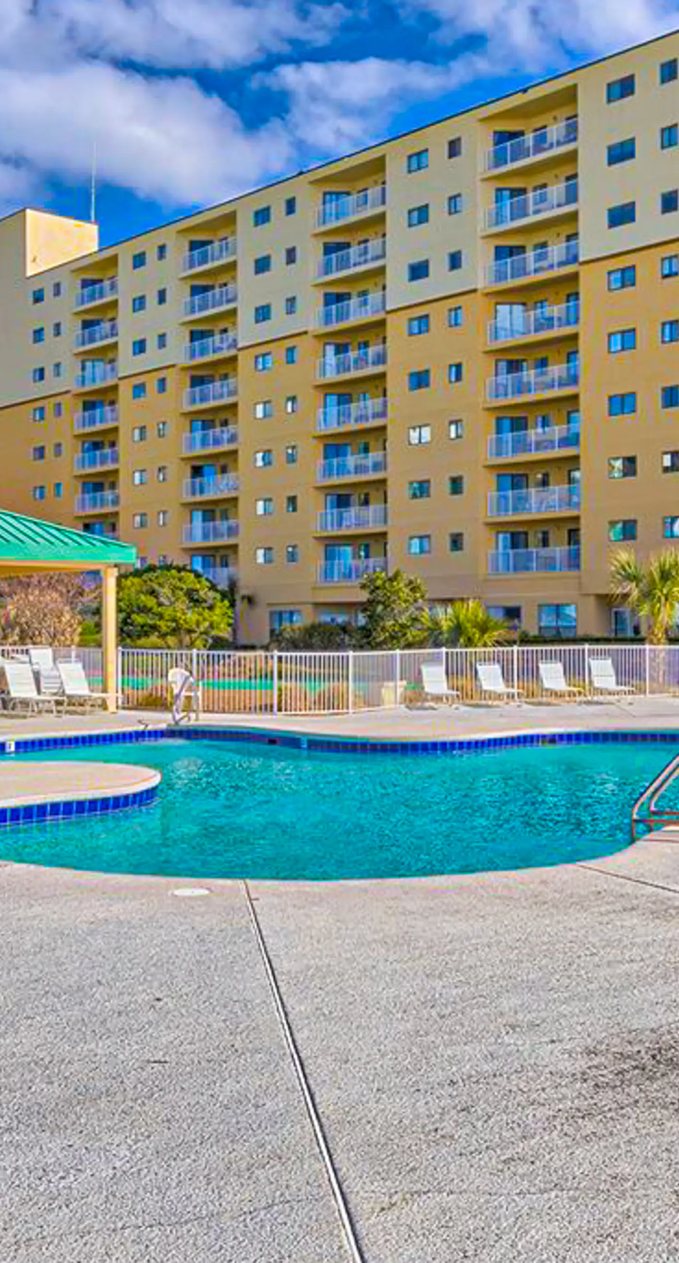 Gulf-view condo with 4 pools, hot tubs, beach access, central AC, & washer/dryer