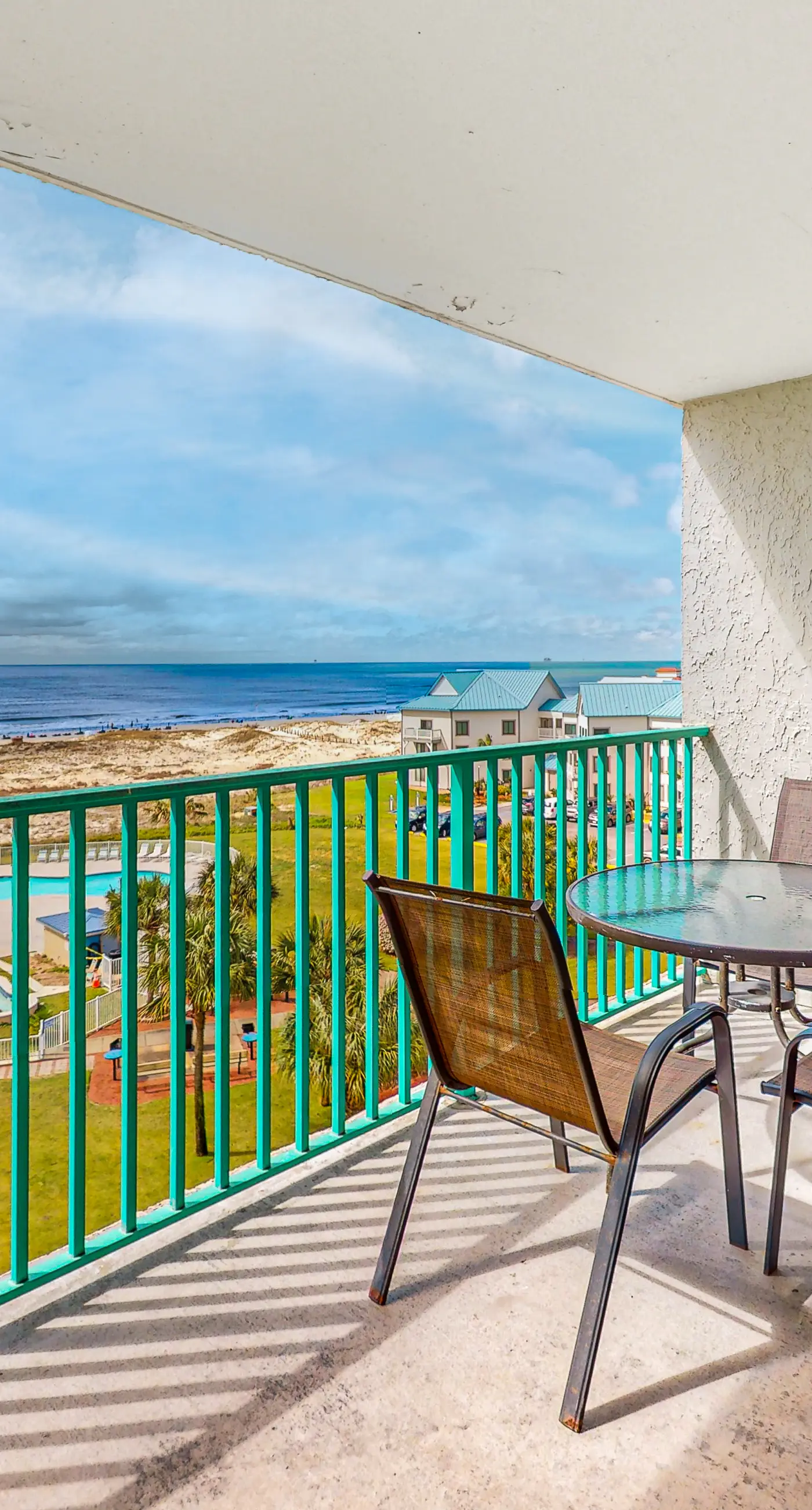 Beachfront condo with Gulf views, pools, hot tubs, tennis, & balcony