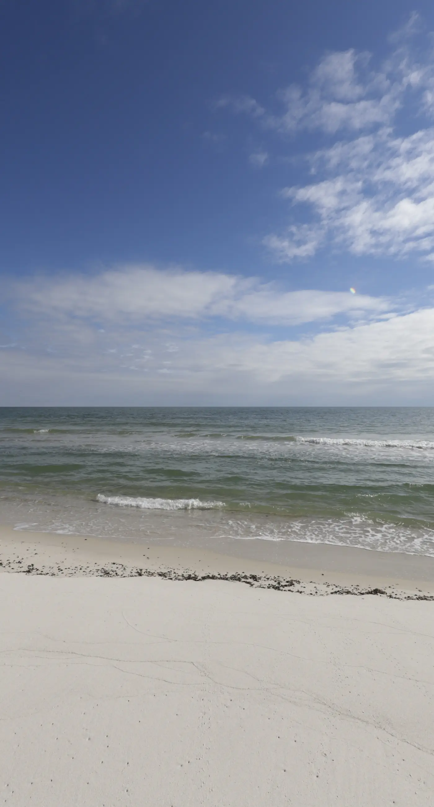 Dog-friendly home with beach access, outdoor pool, and tennis - gated community