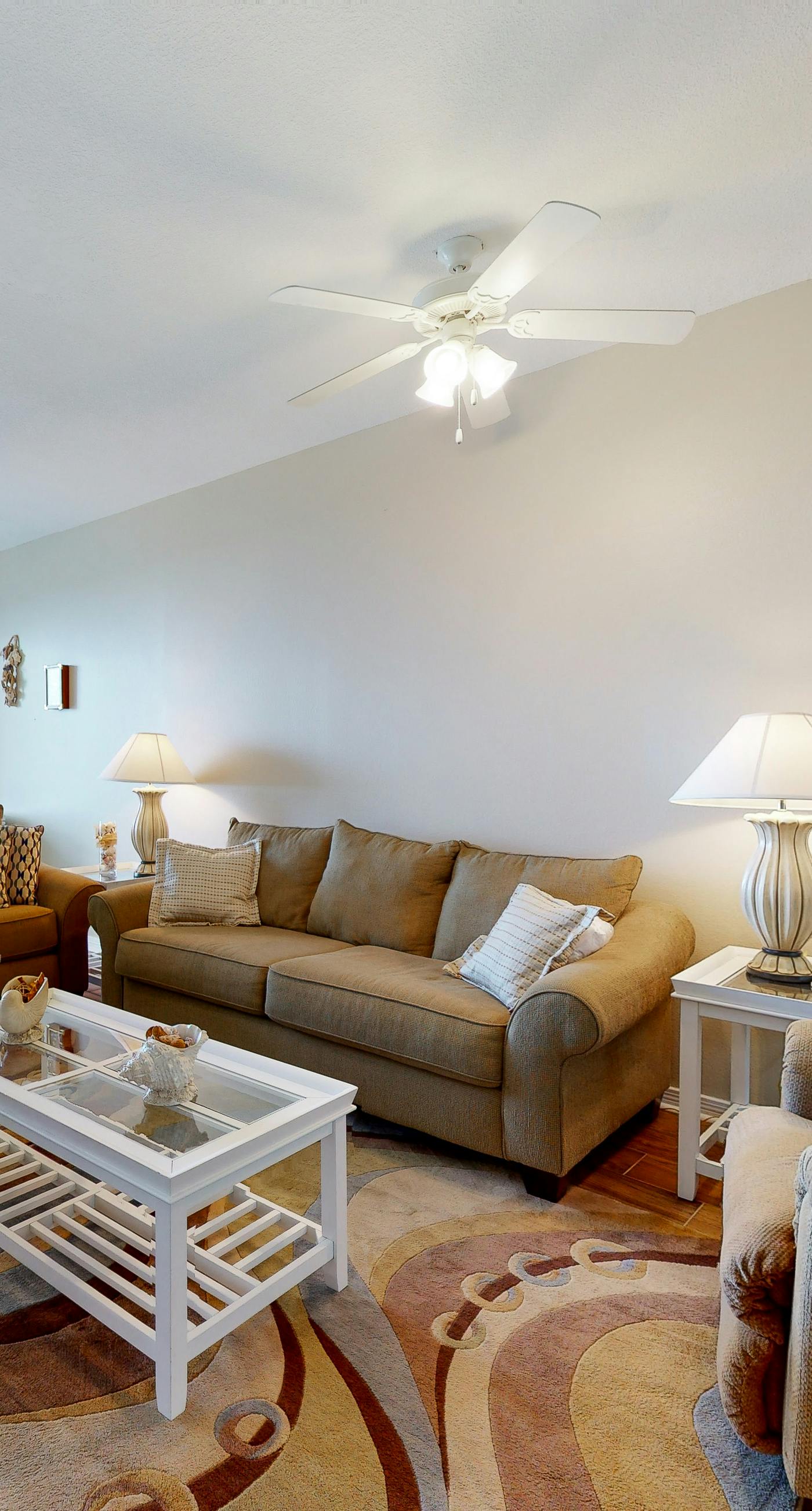 Waterfront condo with bay views, pool, hot tub, boat ramp, & private balcony