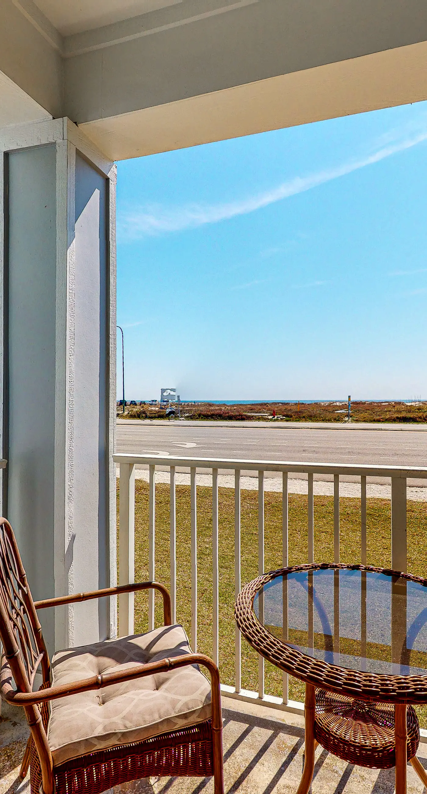 Convenient condo w/ private balcony, beach views, shared pool & AC