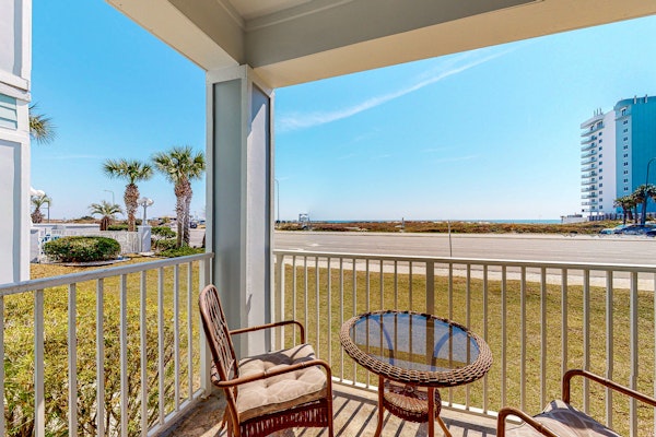 Convenient condo w/ private balcony, beach views, shared pool & AC