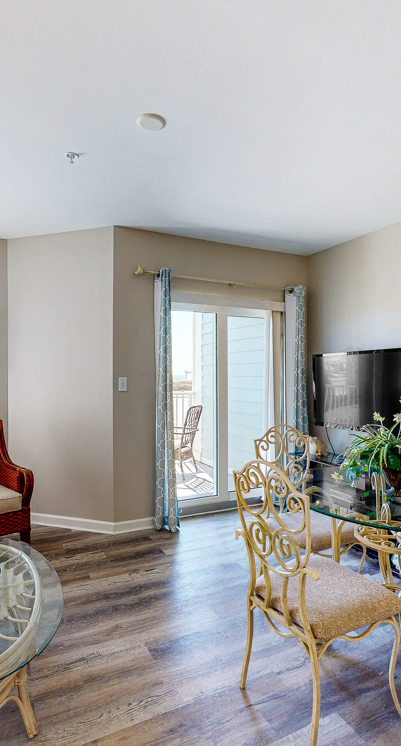 Convenient condo w/ private balcony, beach views, shared pool & AC