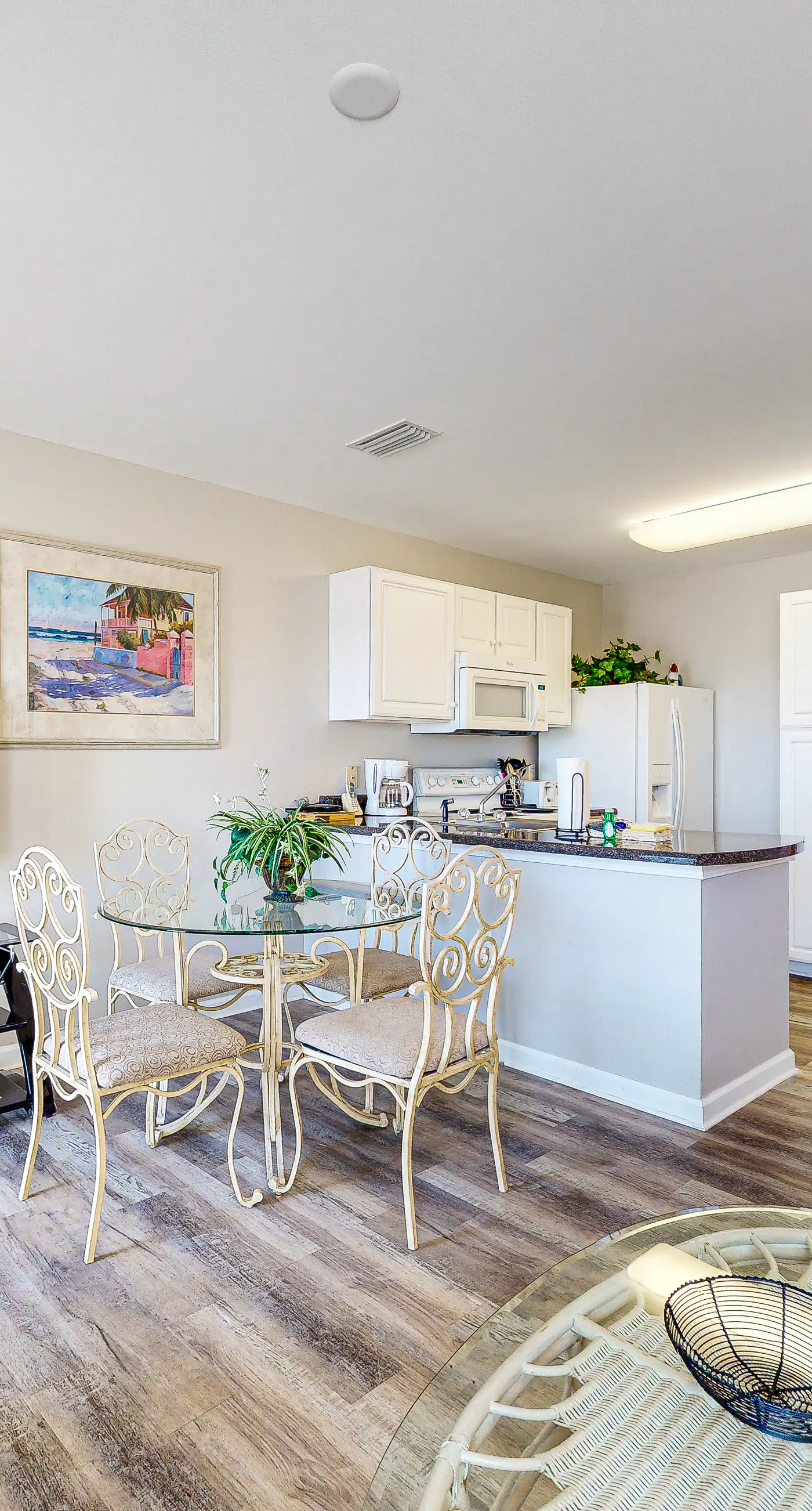 Convenient condo w/ private balcony, beach views, shared pool & AC