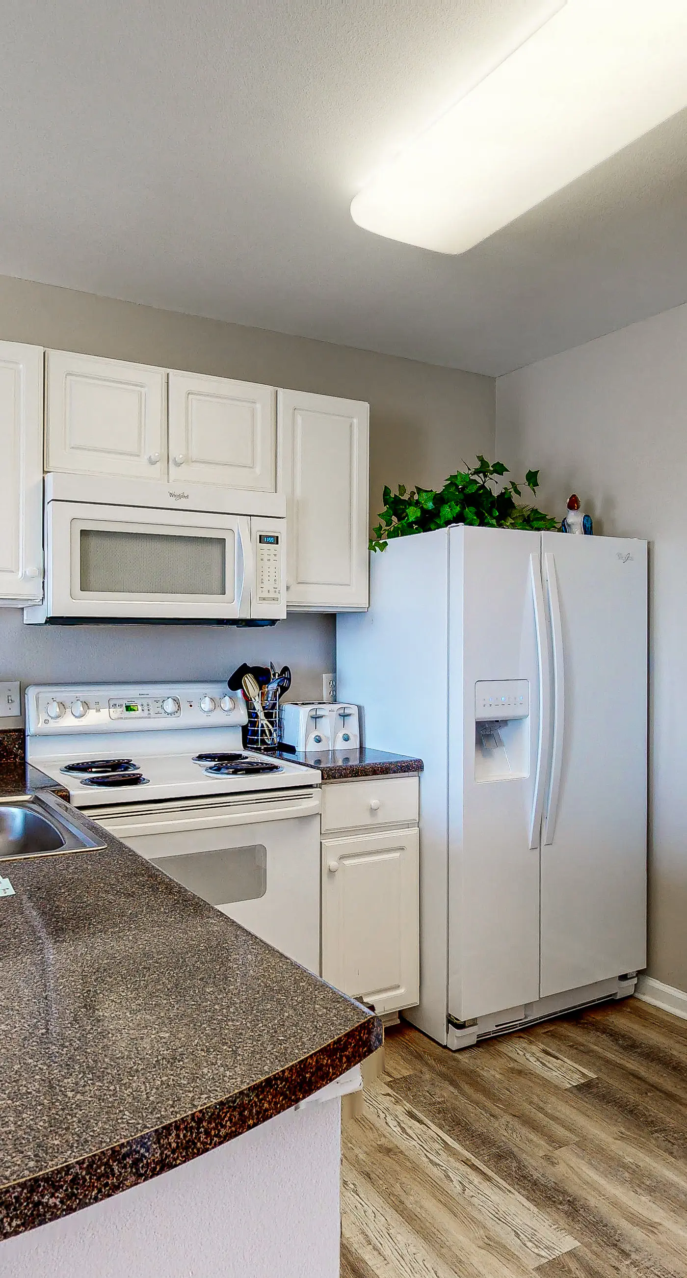 Convenient condo w/ private balcony, beach views, shared pool & AC