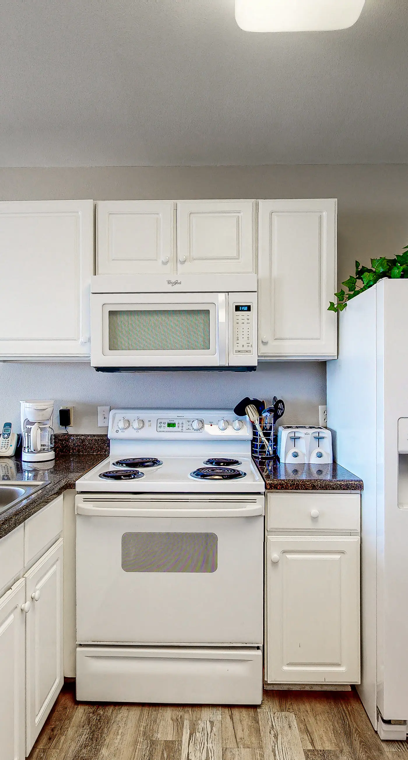 Convenient condo w/ private balcony, beach views, shared pool & AC