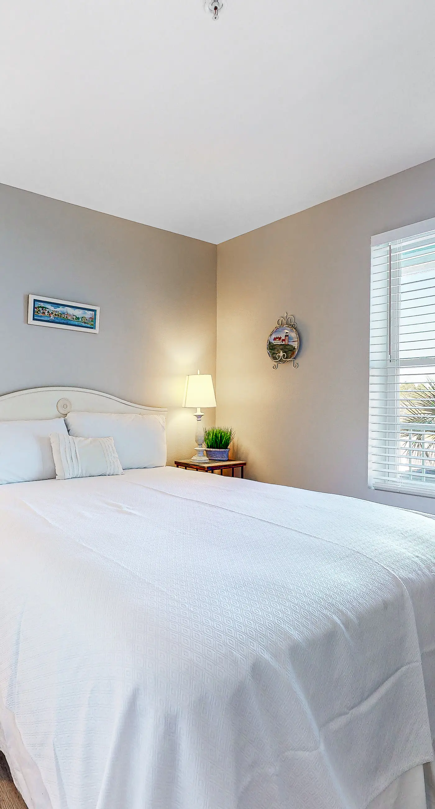 Convenient condo w/ private balcony, beach views, shared pool & AC