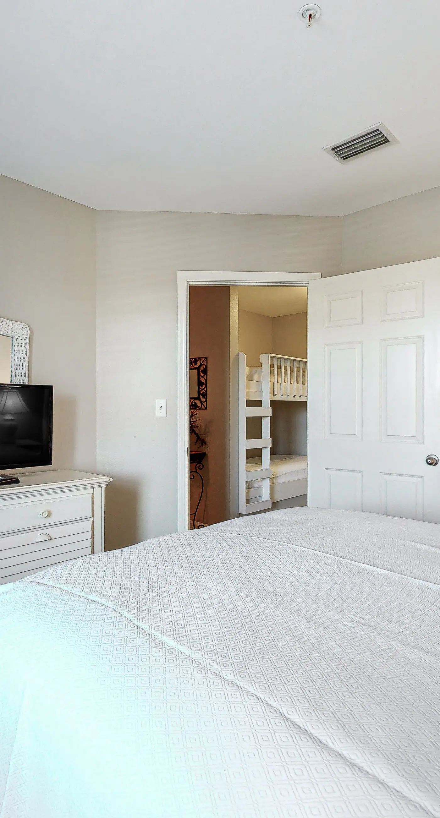 Convenient condo w/ private balcony, beach views, shared pool & AC