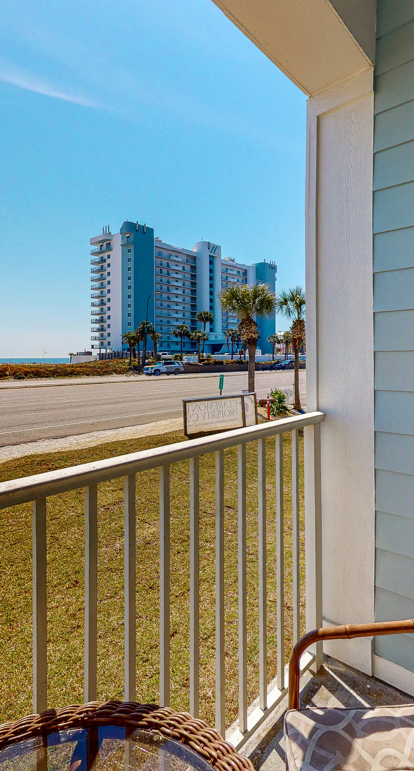 Convenient condo w/ private balcony, beach views, shared pool & AC