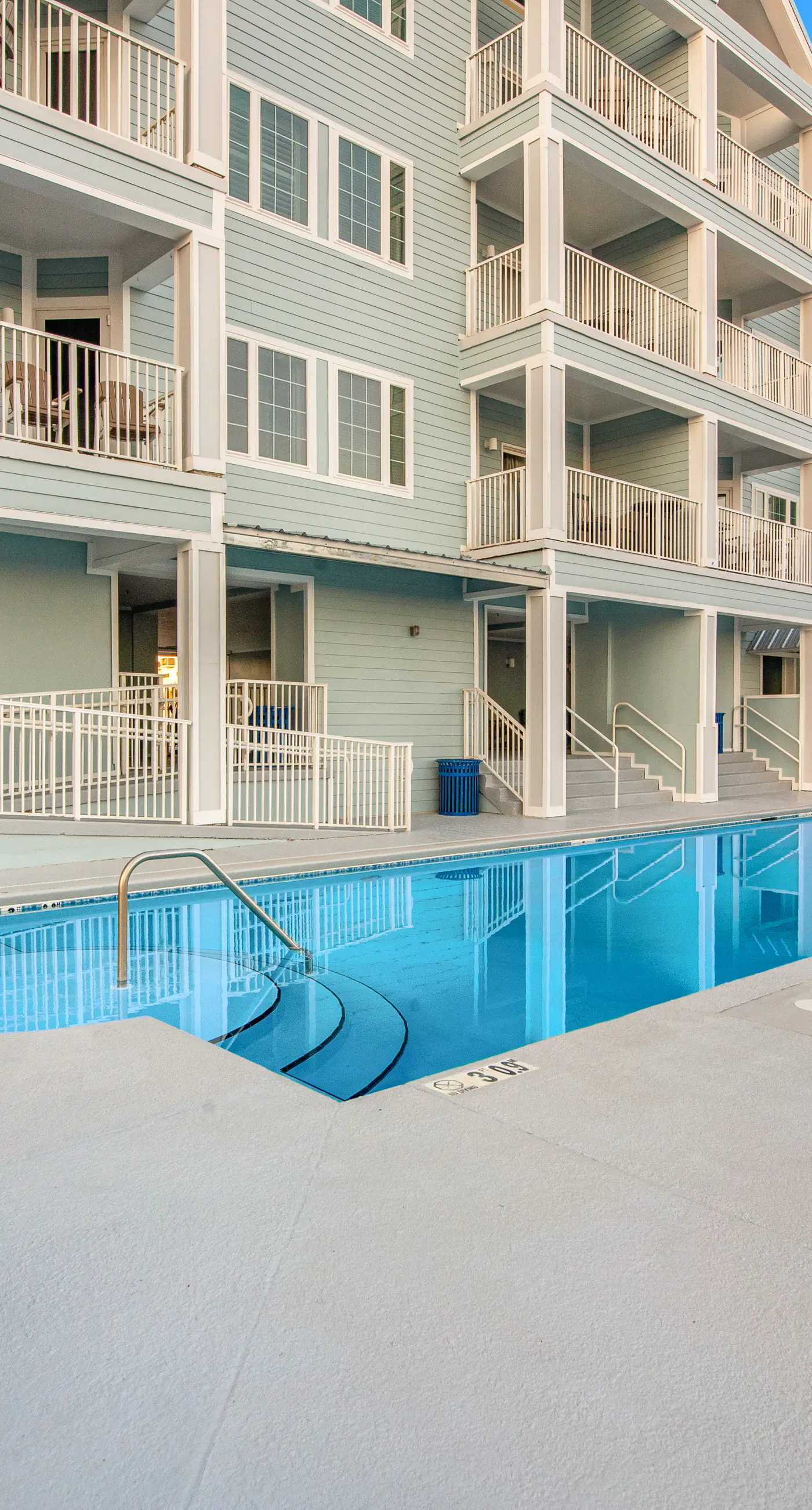 Convenient condo w/ private balcony, beach views, shared pool & AC