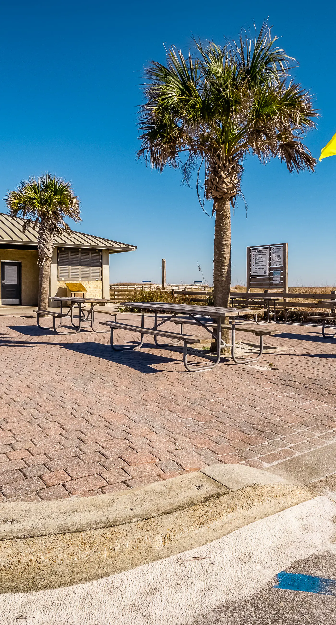 Convenient condo w/ private balcony, beach views, shared pool & AC